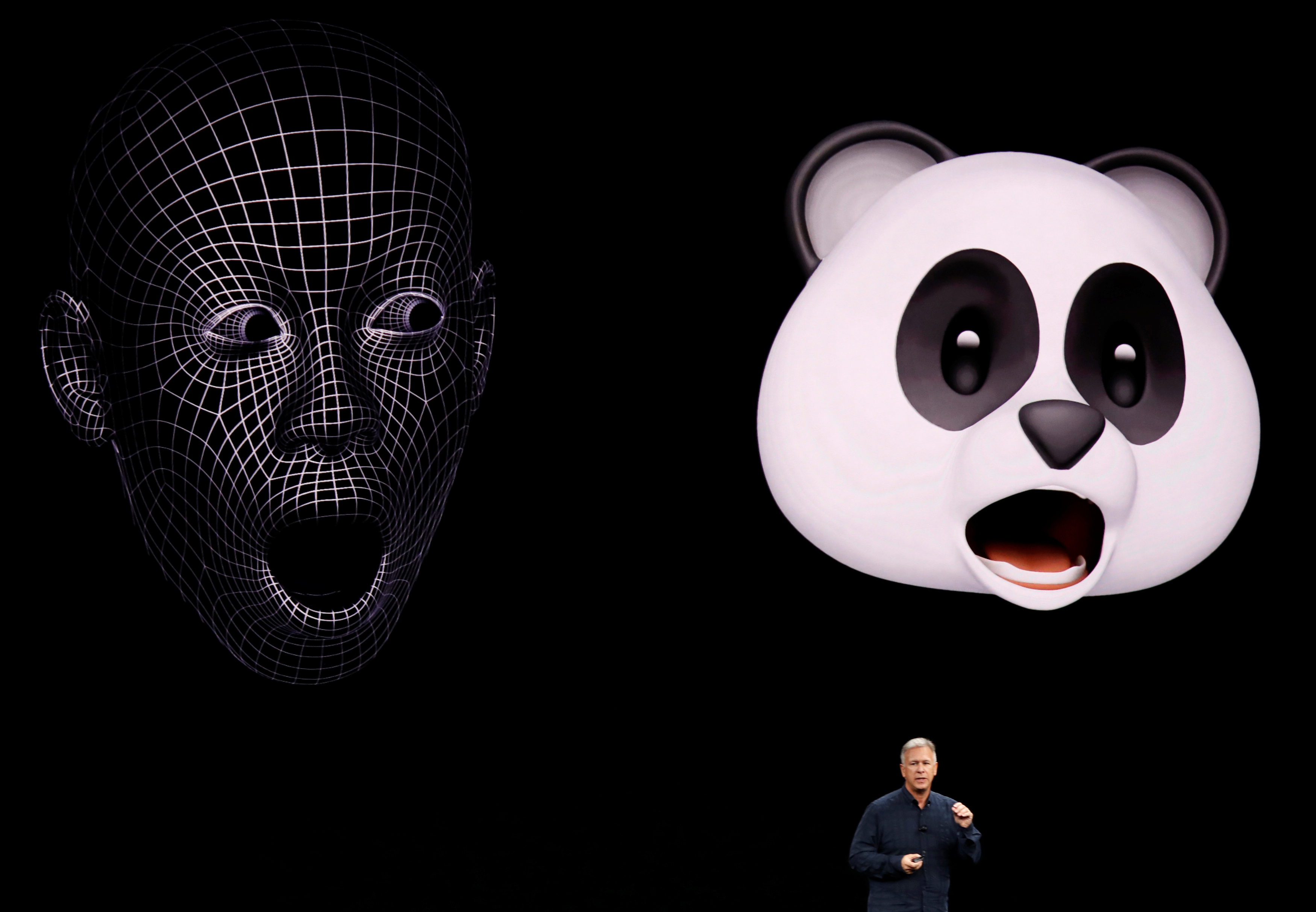 Apple's Schiller shows Animoji during a launch event in Cupertino