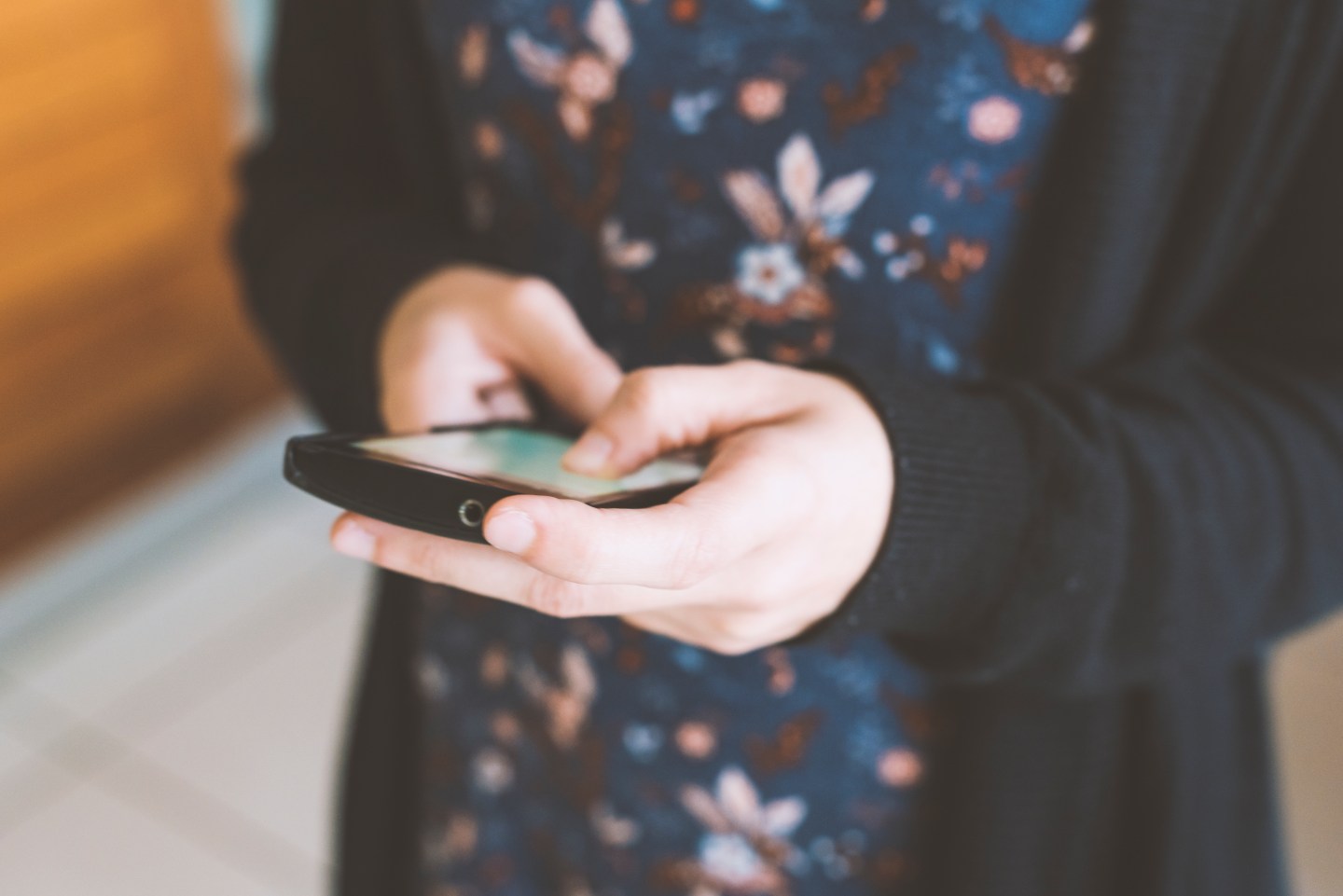 Woman using her mobile phone