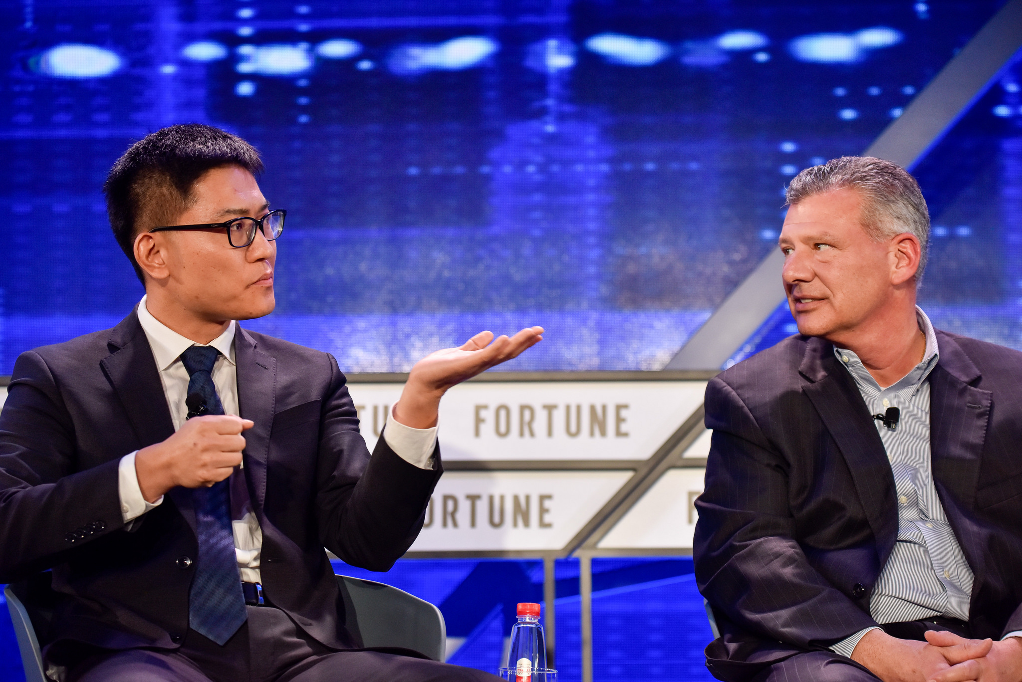 Wang Yi, founder of artificial intelligence-powered language learning app Lingo Champ and Tom Rosamilia, senior vice president of IBM Systems.