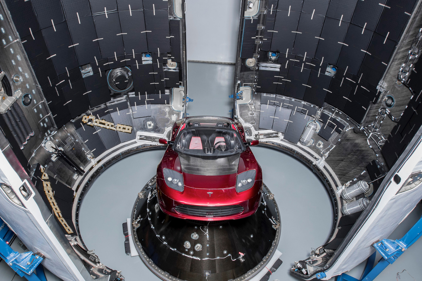 A 2018 Tesla Roadster positioned inside SpaceX's Falcon Heavy rocket