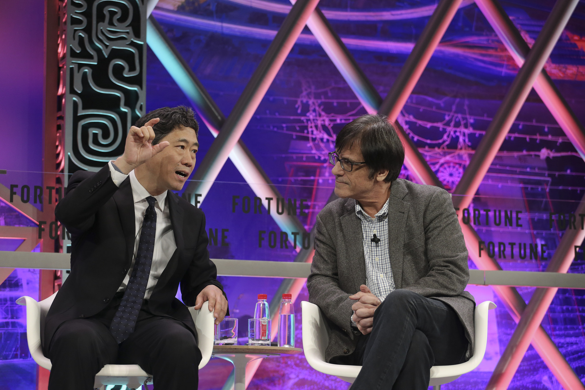 Tsinghua University economics professor David Li and Peking University finance professor Michael Pettis debate the meaning of China's GDP growth figure at the 2017 Fortune Global Forum in Guangzhou, China.