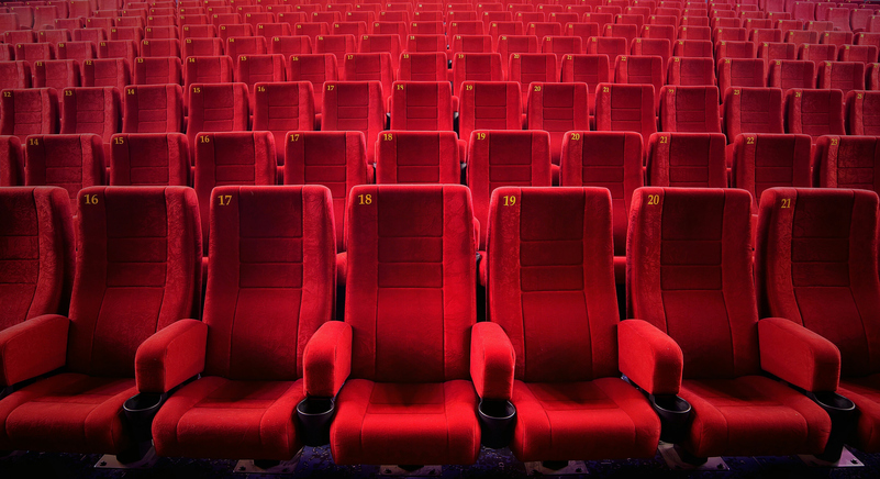 Red Empty Seats At Movie Theater