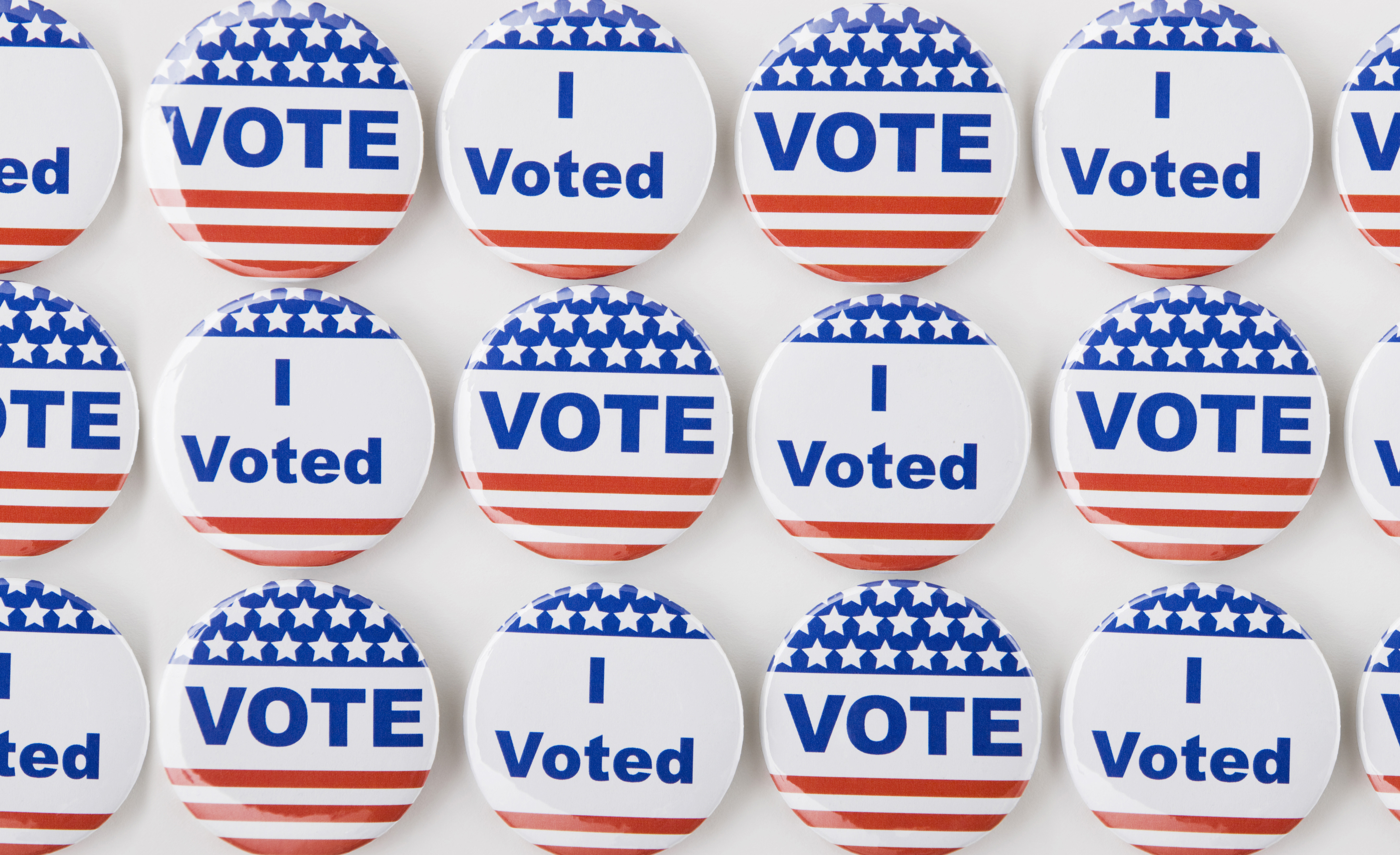 Rows of American vote buttons