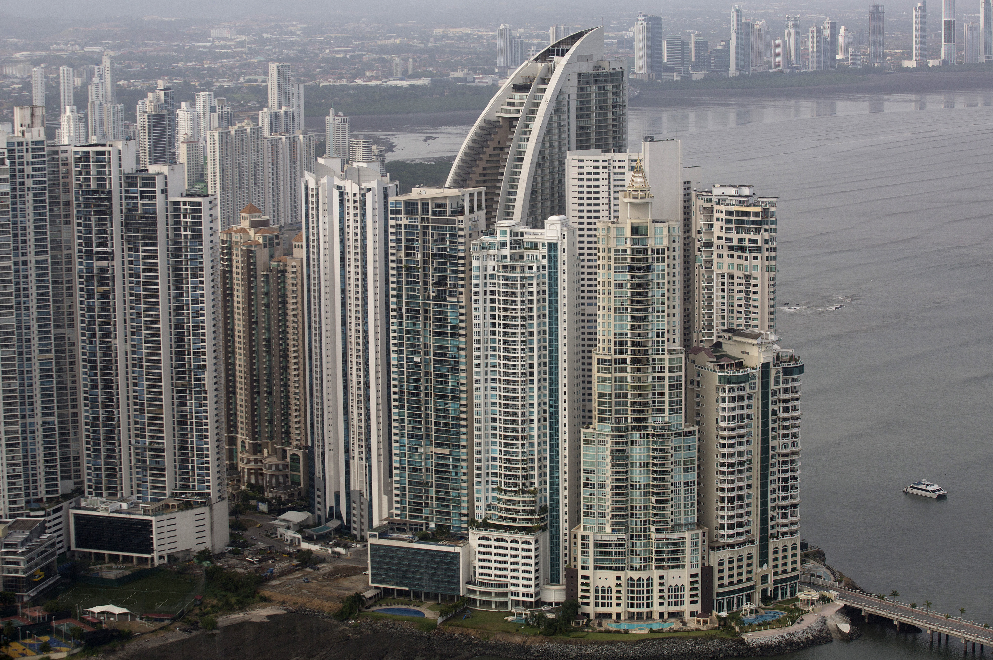 Buildings stand in the skyline, including the Trump Ocean C