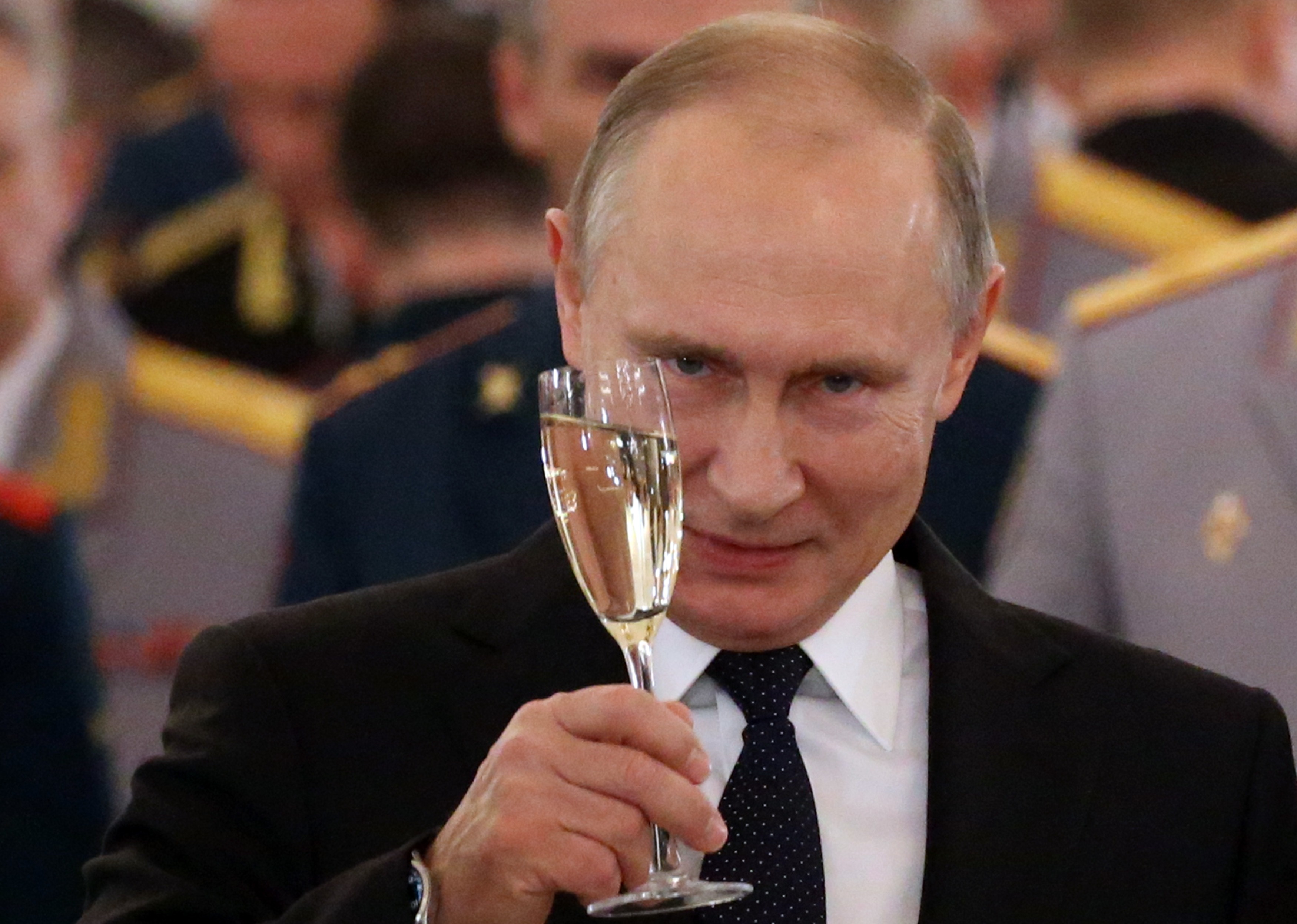 Russian President Vladimir Putin attends a reception for military servicemen who took part in Syrian campaign