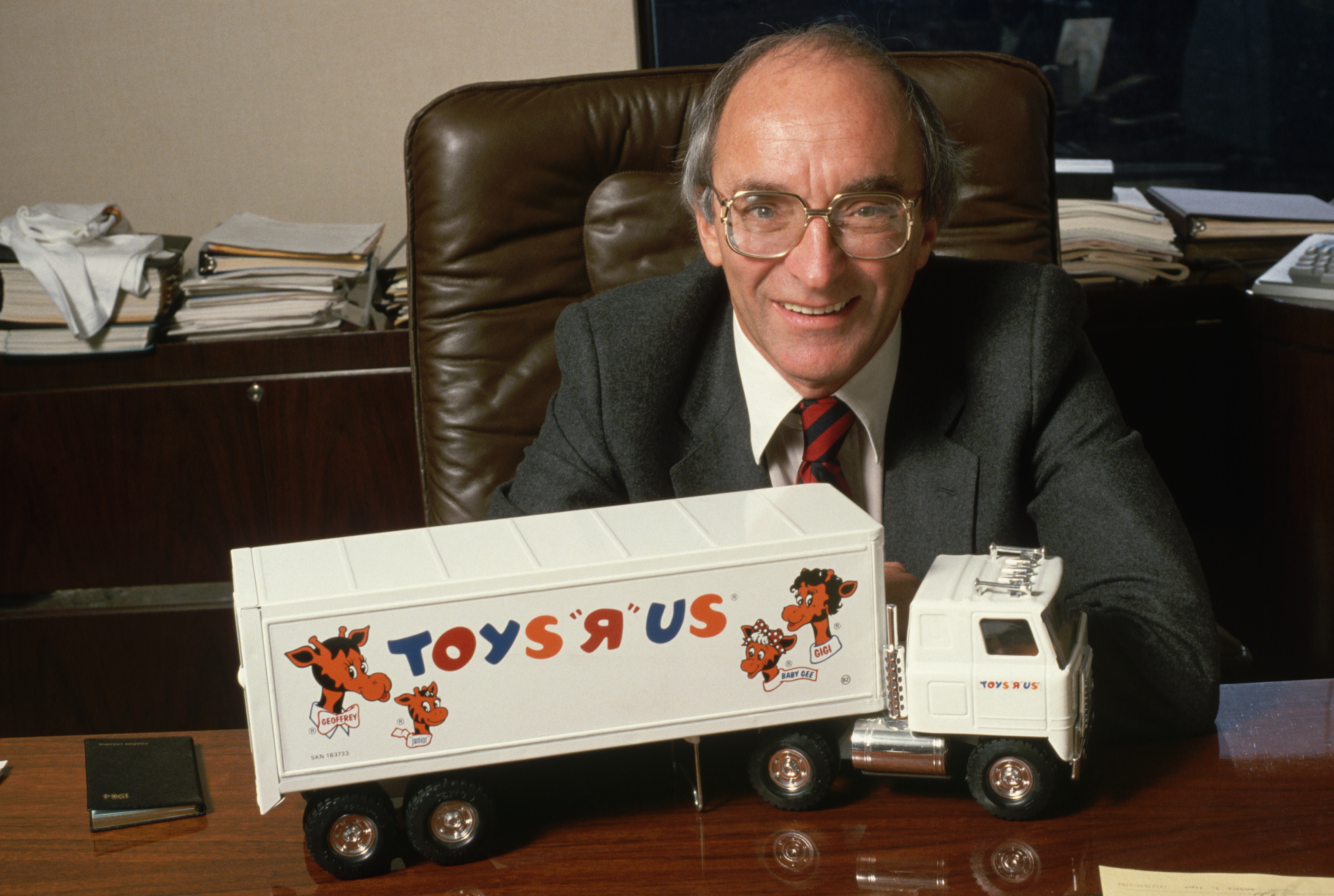 Charles Lazarus, the creator and founder of Toys "R" Us, is seen with Toy Truck