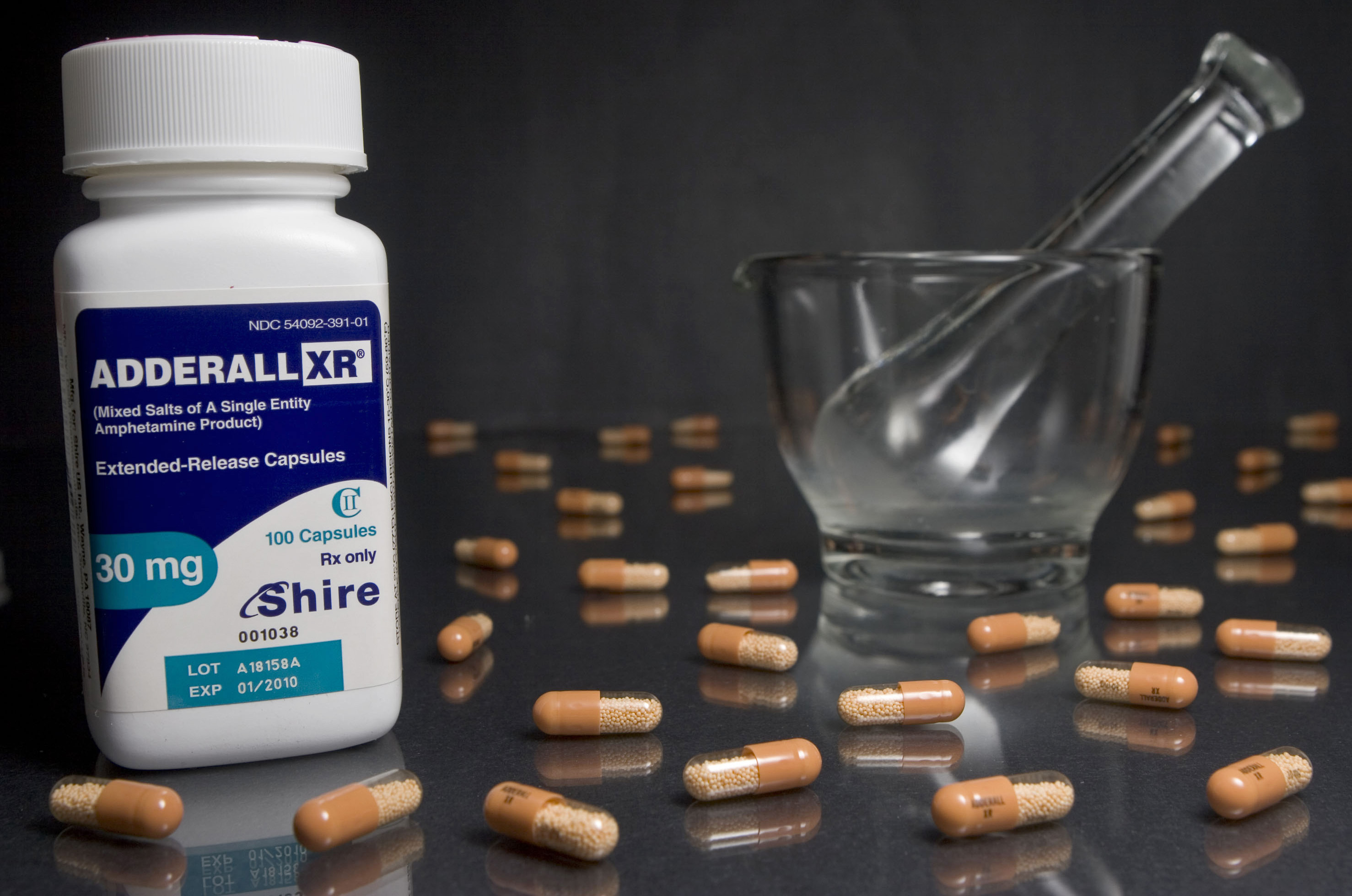 30mg tablets of Shire Plc's Adderall XR are arranged in fron