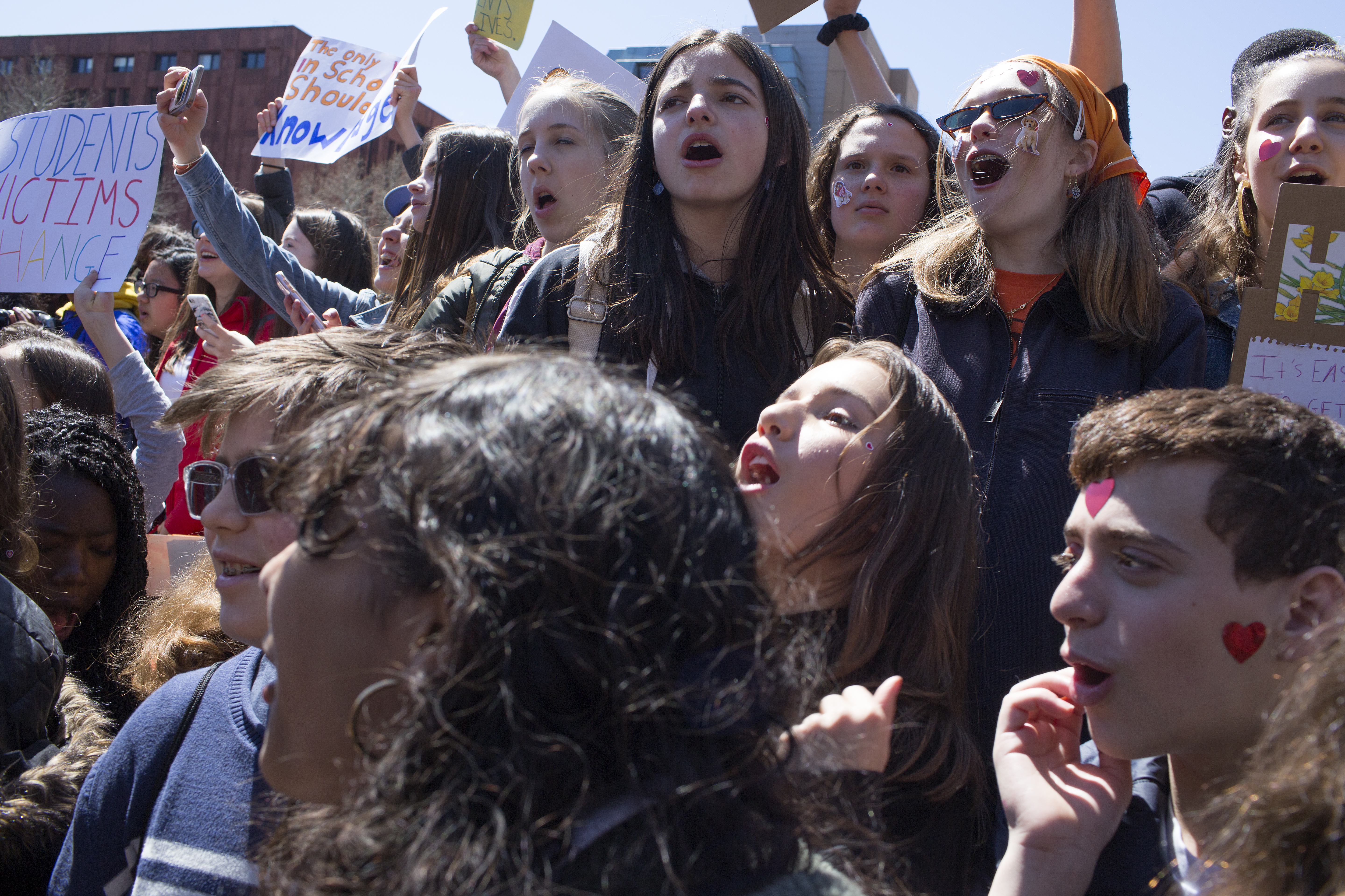 On the anniversary of the Columbine shooting, thousands of New York teenagers walk out of school to attend a gun control rally.