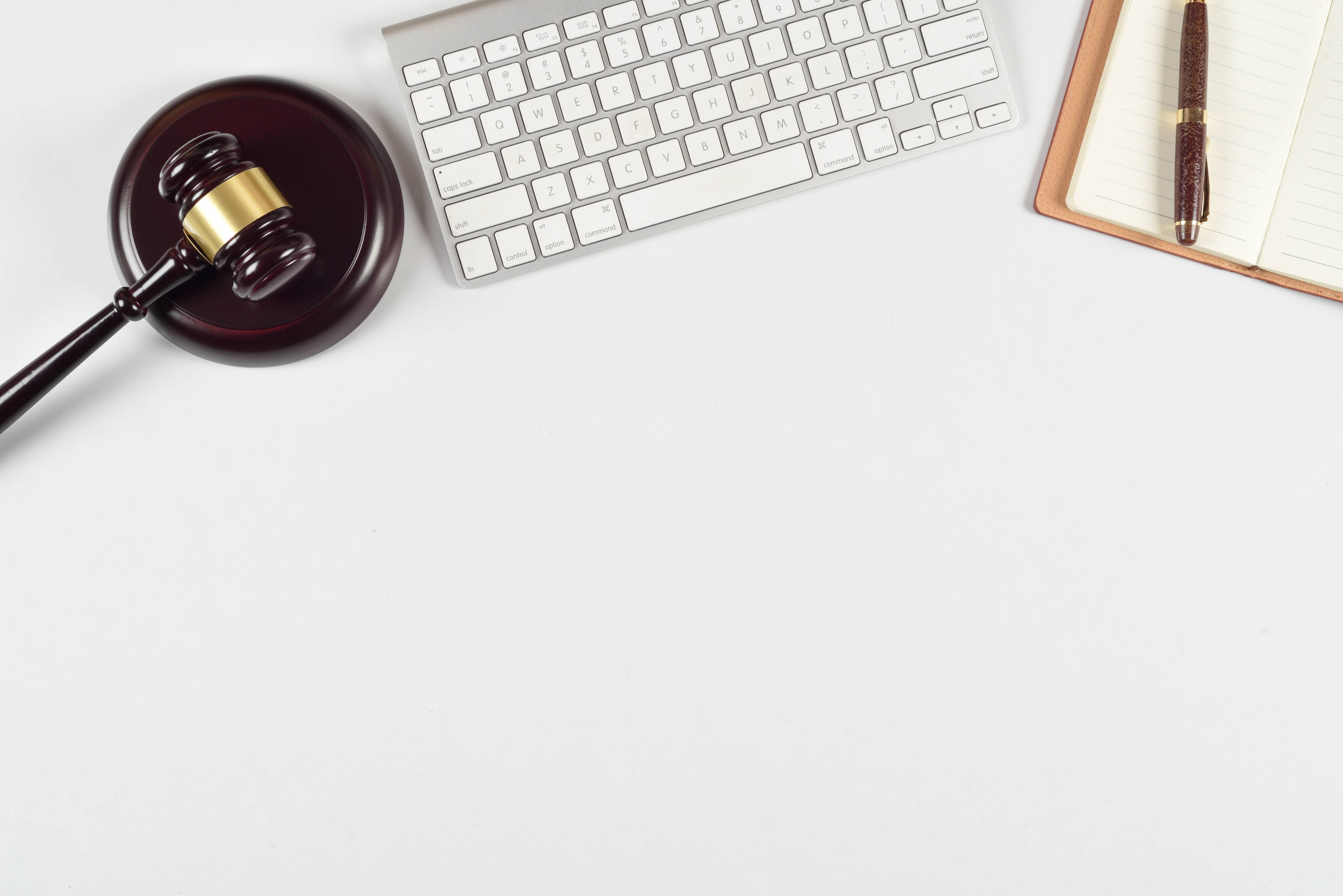 Mortgage advisory concept with Gavel, computer keyboard, document, top view flat lay
