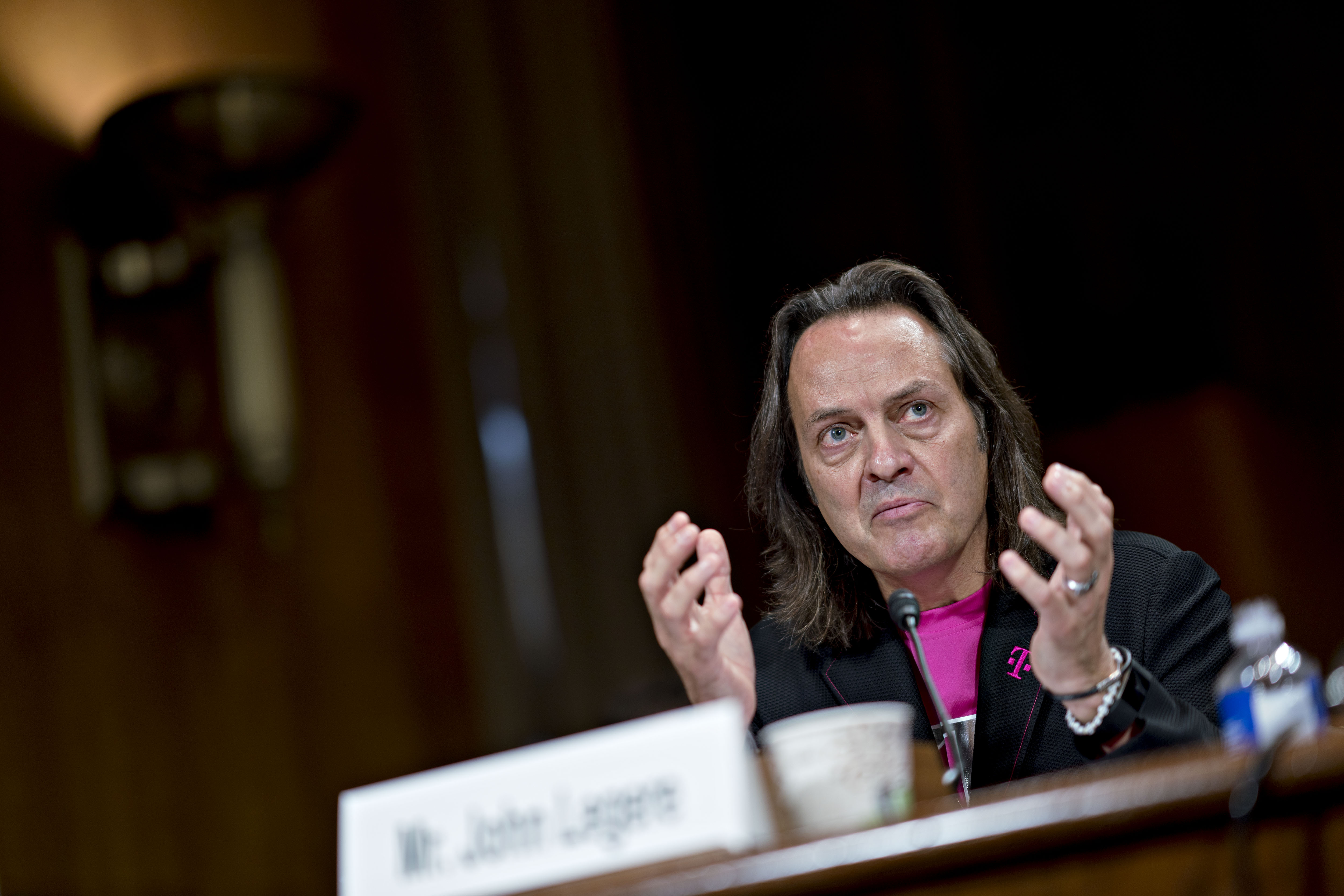 T-Mobile CEO John Legere testifies about the proposed merger with Sprint at a Senate hearing