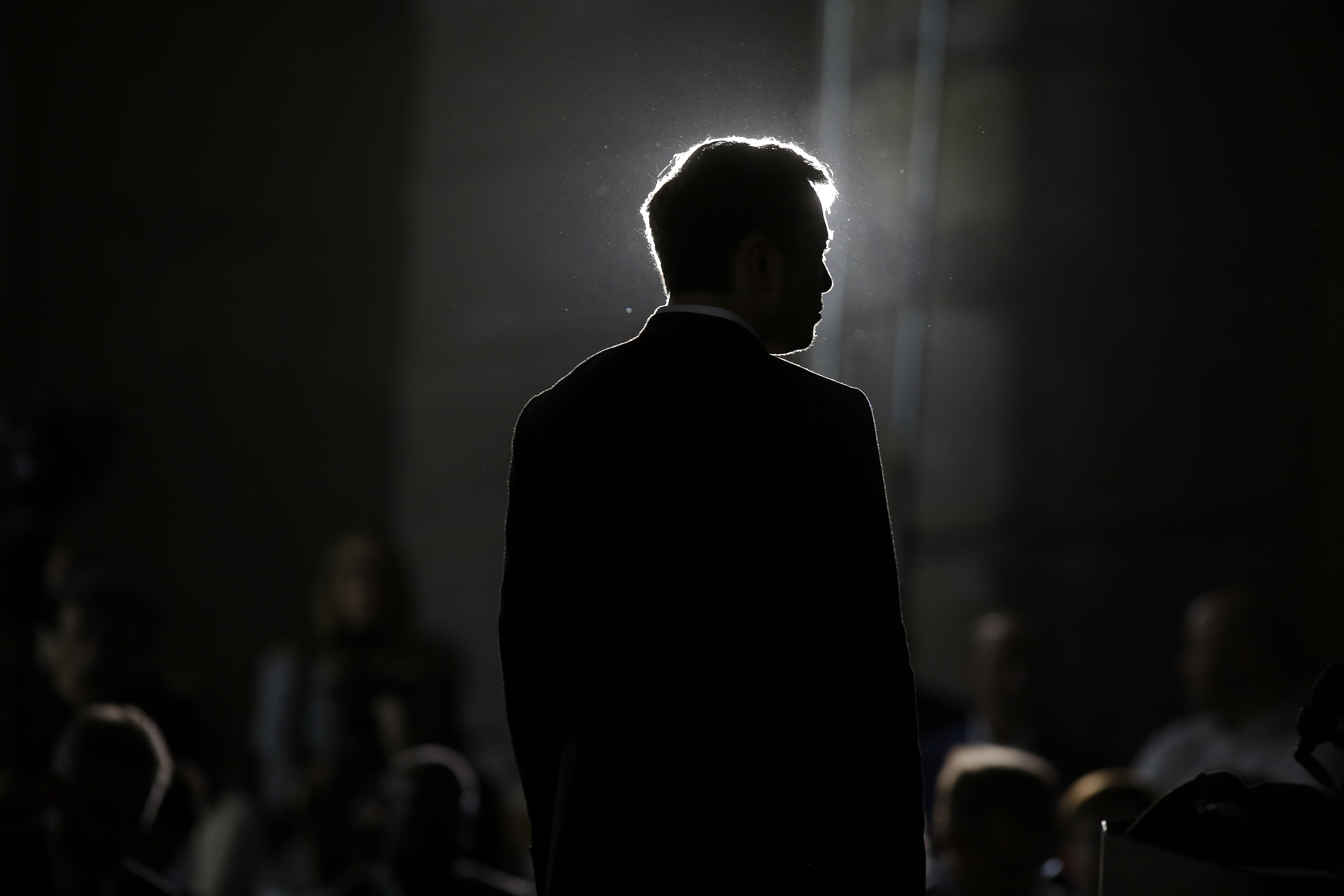 Elon Musk, CEO of Tesla and SpaceX, listens as Chicago Mayor Rahm Emanuel talks about constructing a high speed transit tunnel on June 14, 2018 in Chicago, Illinois.