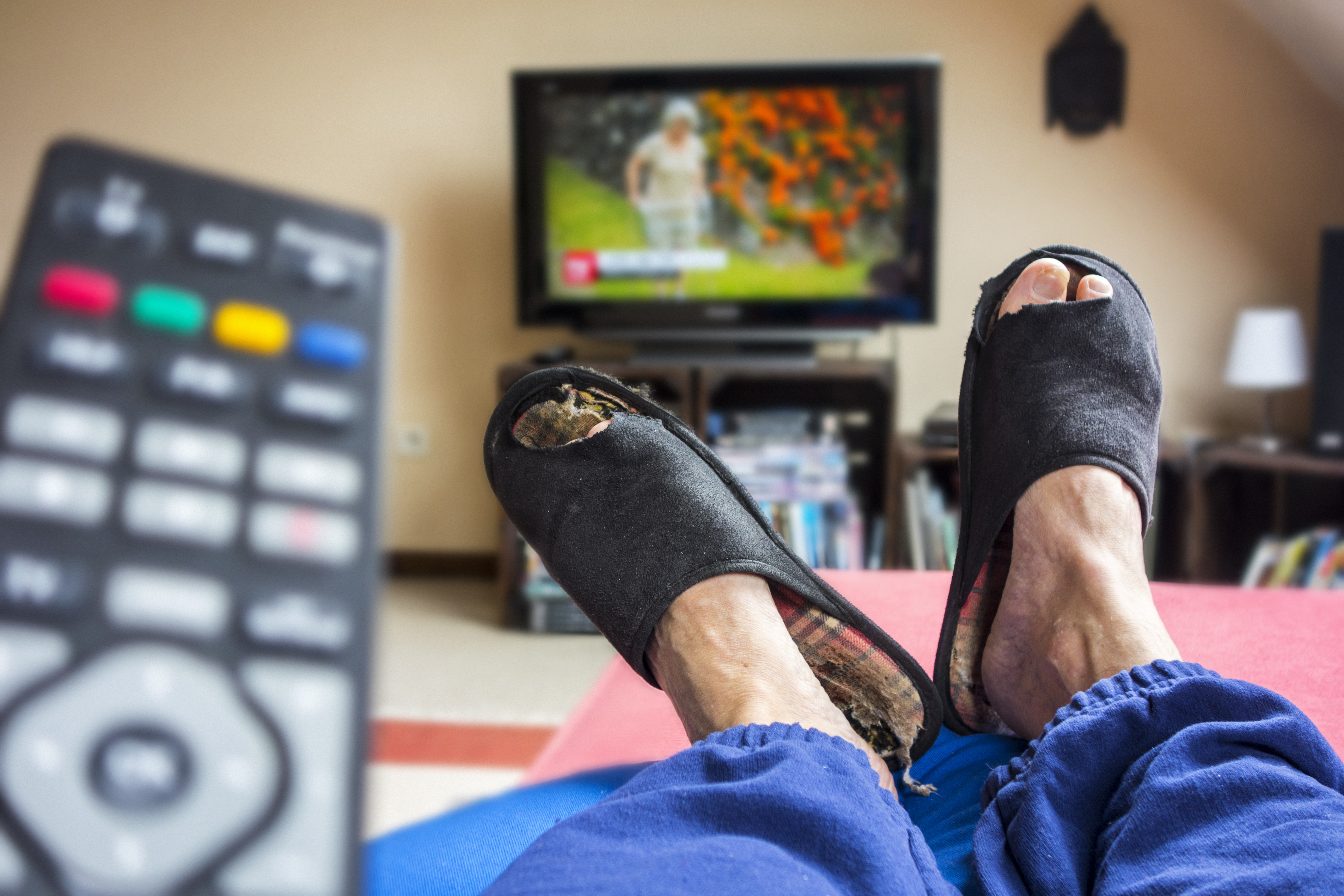 Couch potato watching TV.