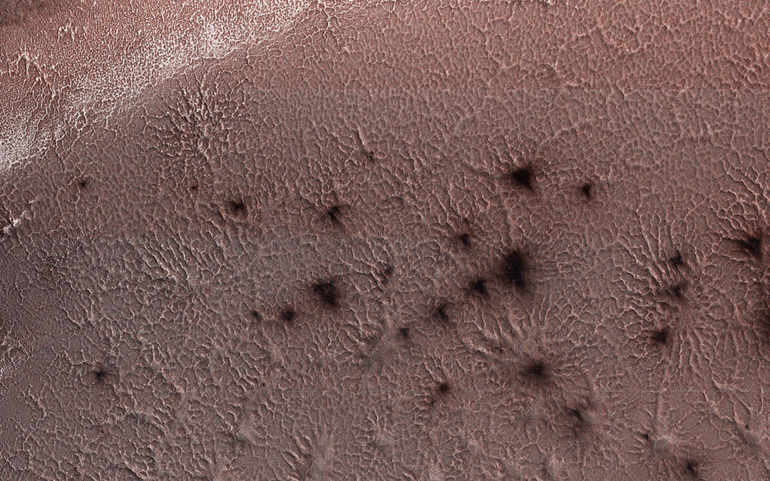 spider-like topographical formations on the surface of Mars.