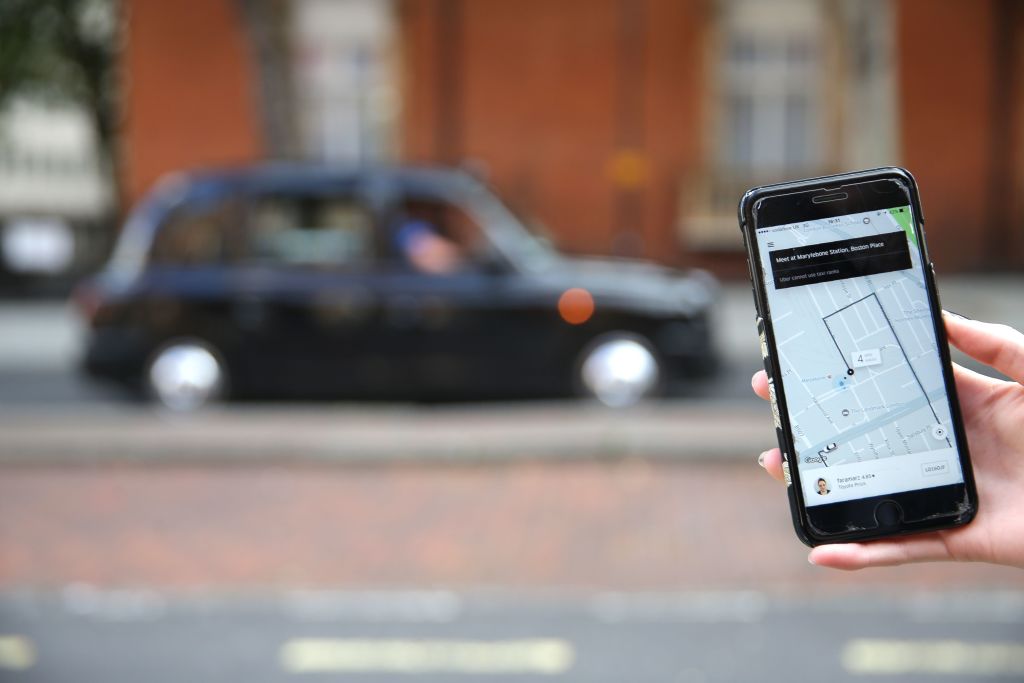 BRITAIN-US-TRANSPORT-TAXI-UBER