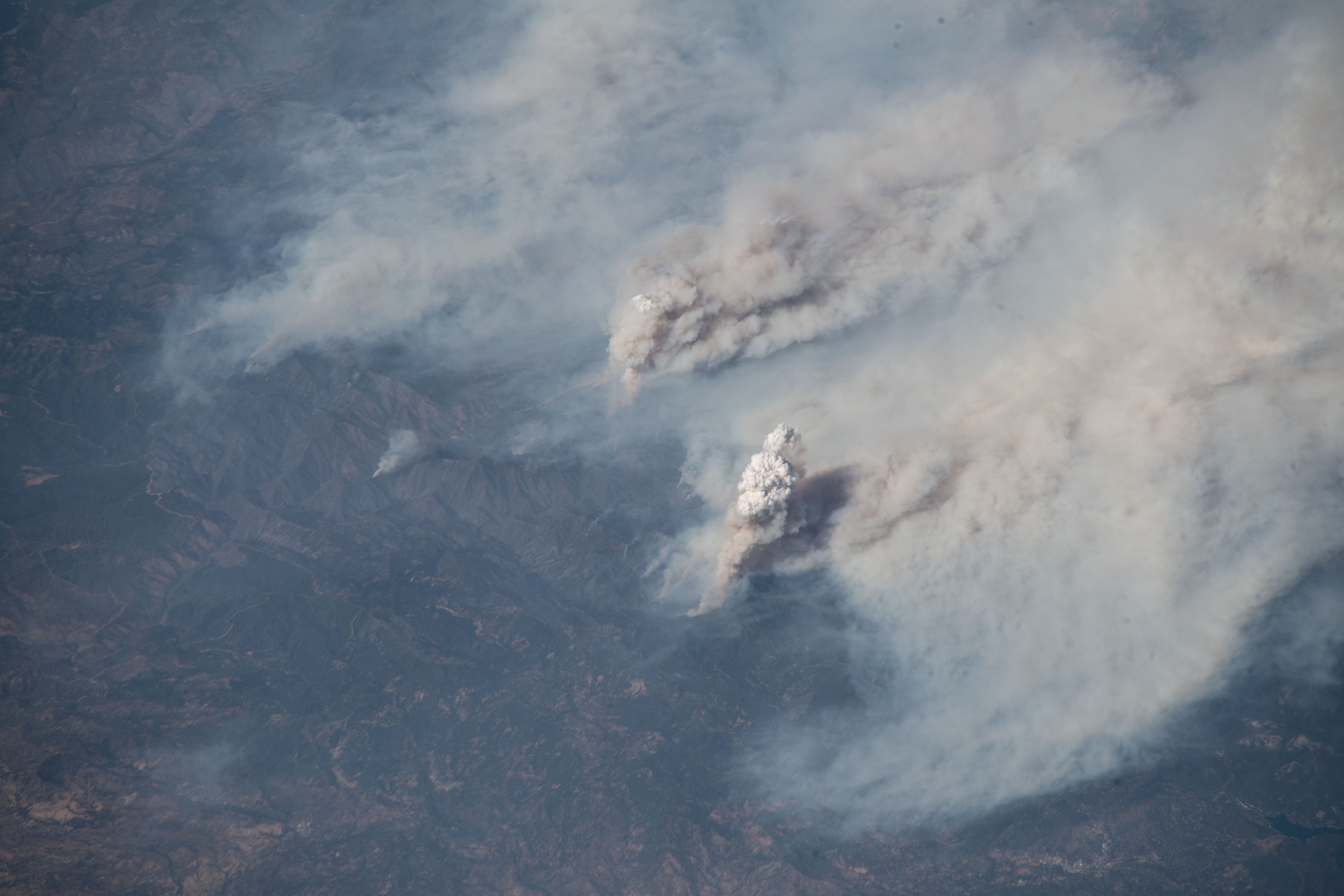 The Earth, in all its majesty and its tragedy, is the subject of images taken aboard the International Space Station. This image of the Carr and Ferguson fires was captured by European Space Agency astronaut Alexander Gerst (@Astro_Alex), on August 3, 2018, from the station.
"California burning. These fires are frightening to watch, even from space. Here's a shout-out from space to all firefighters on this planet, my former colleagues. Stay safe my friends!" Gerst, a geophysicist and volcanologist, wrote on his Twitter account.
Image Credit: NASA