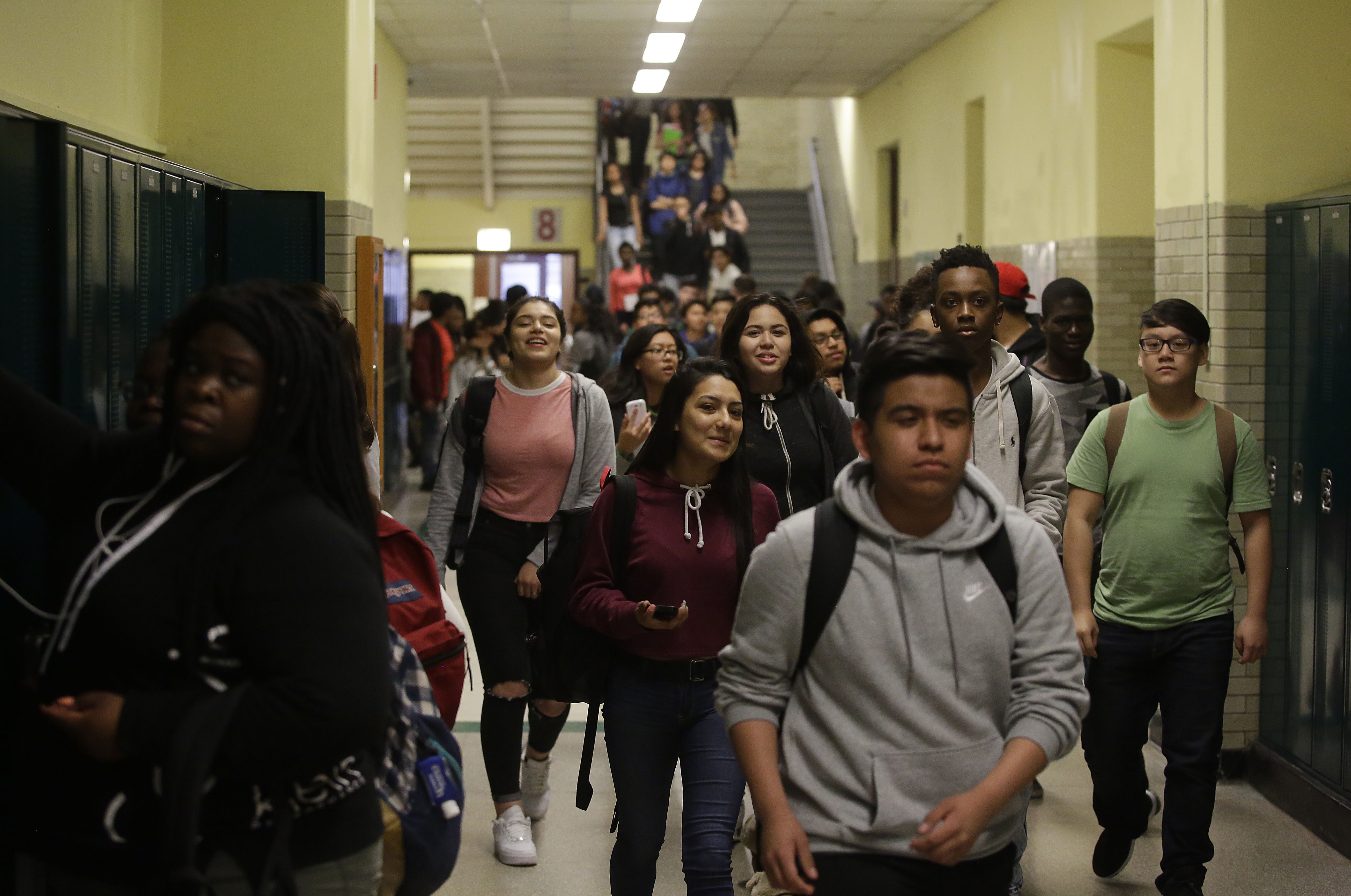 Students walk through the hallway