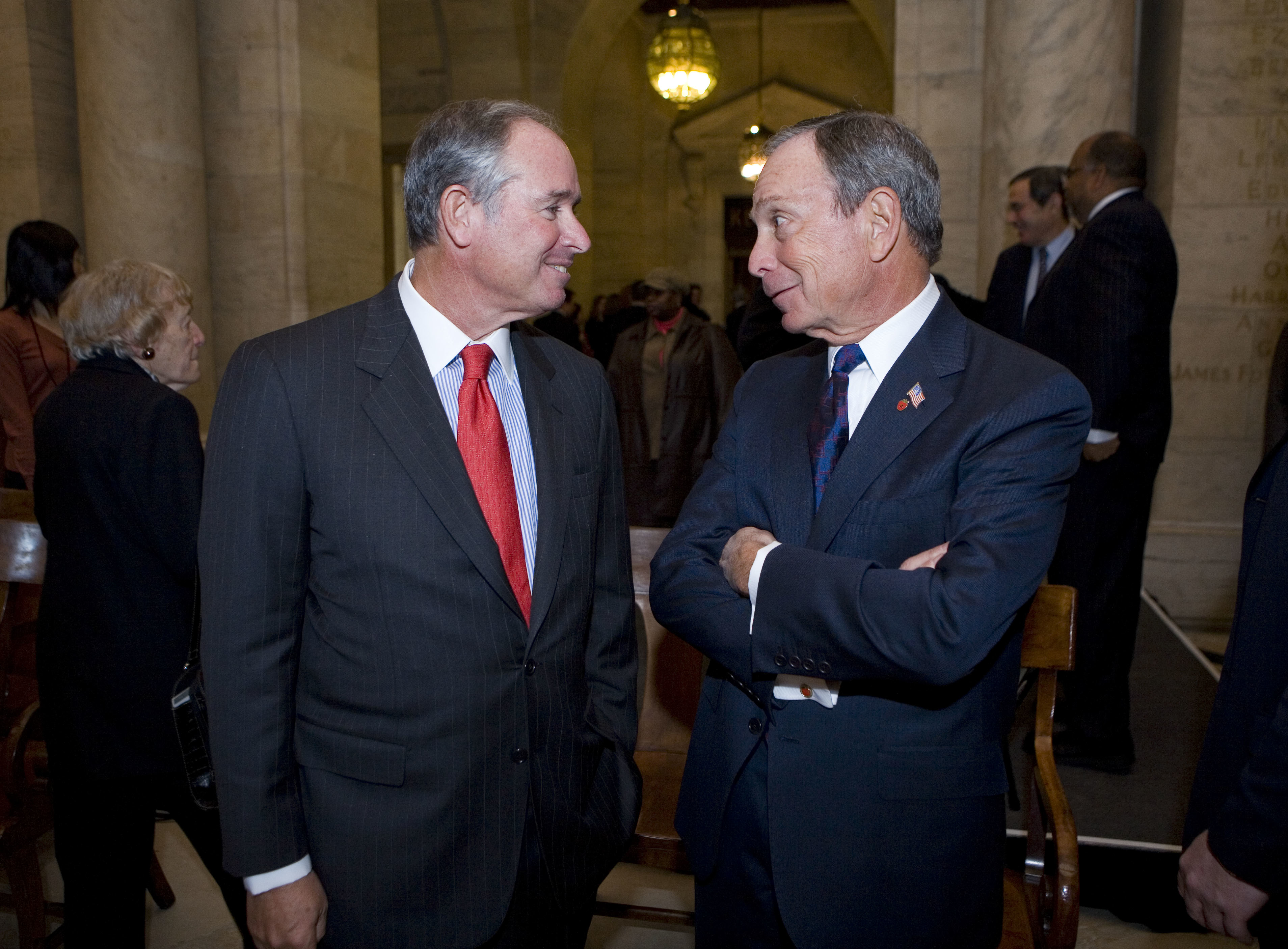New York City Mayor Michael Bloomberg and Blackstone CEO Stephen Schwarzman talk after a news conference at the New York Public Library.