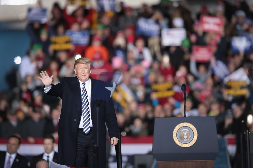 Trump's timing is raising skeptical eyebrows. (Photo by Scott Olson/Getty Images)