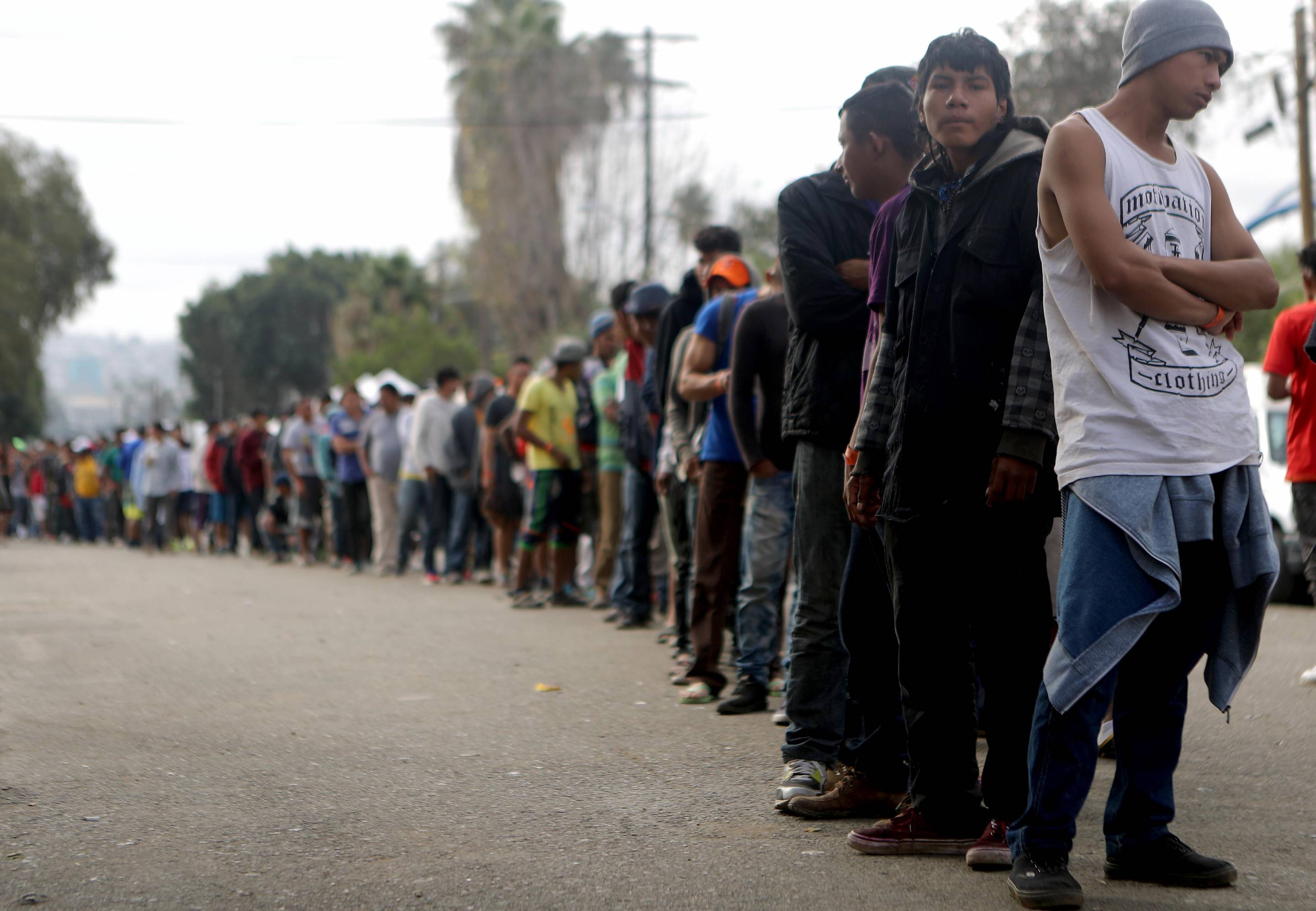 Immigrant Caravan Members Gather At U.S.-Mexico Border