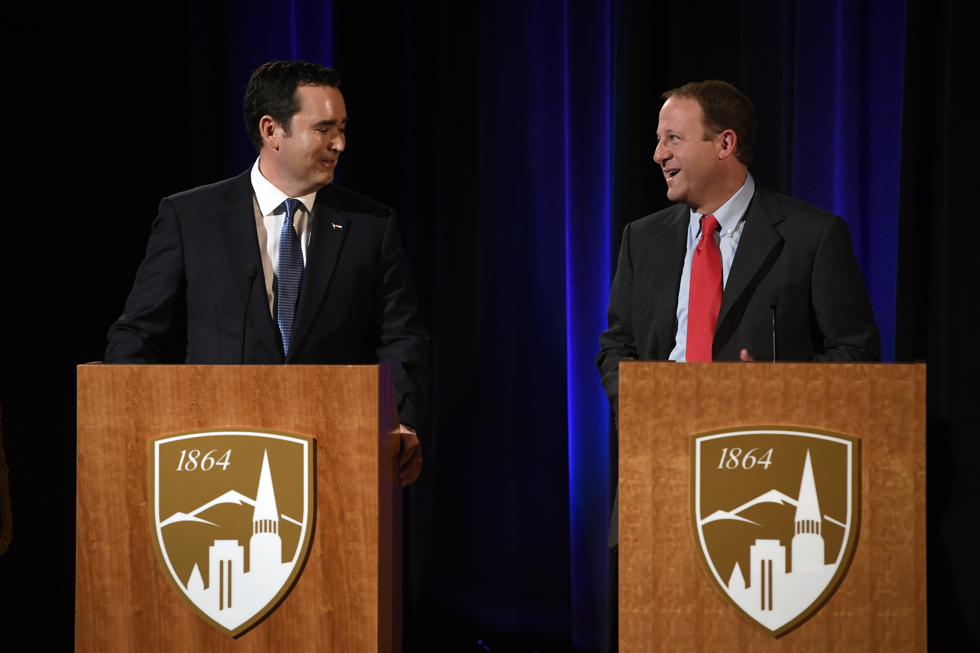 Colorado gubernatorial candidates Walker Stapleton (R), left, and Jared Polis (D) during their last debate before Election Day on Oct. 23, 2018 in Denver.