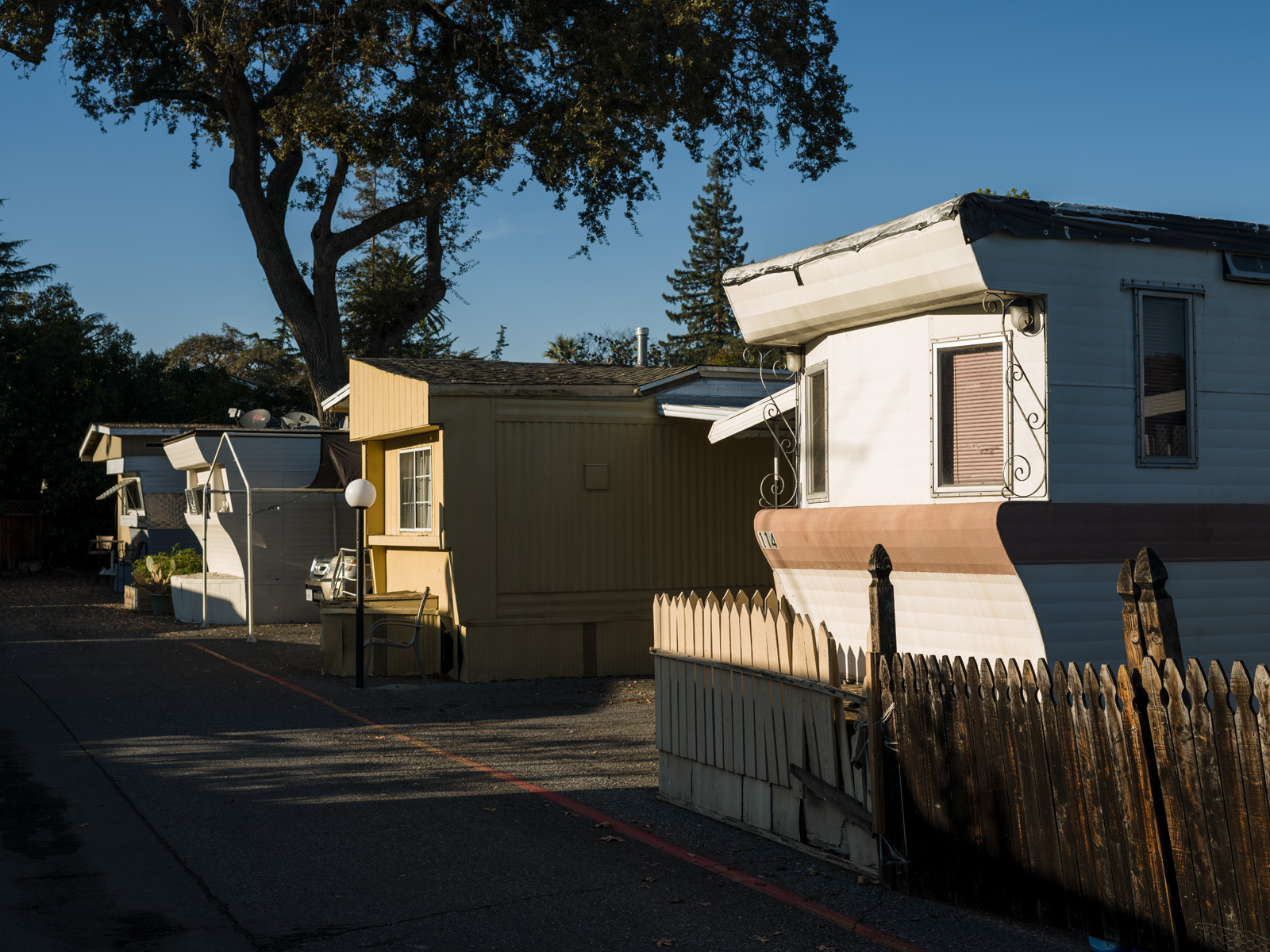 The sun sets on the trailers in the Buena Vista Mobile Home Park. The park offers one of the only affordable housing options in Palo Alto, where the median home price is $3.2 million.