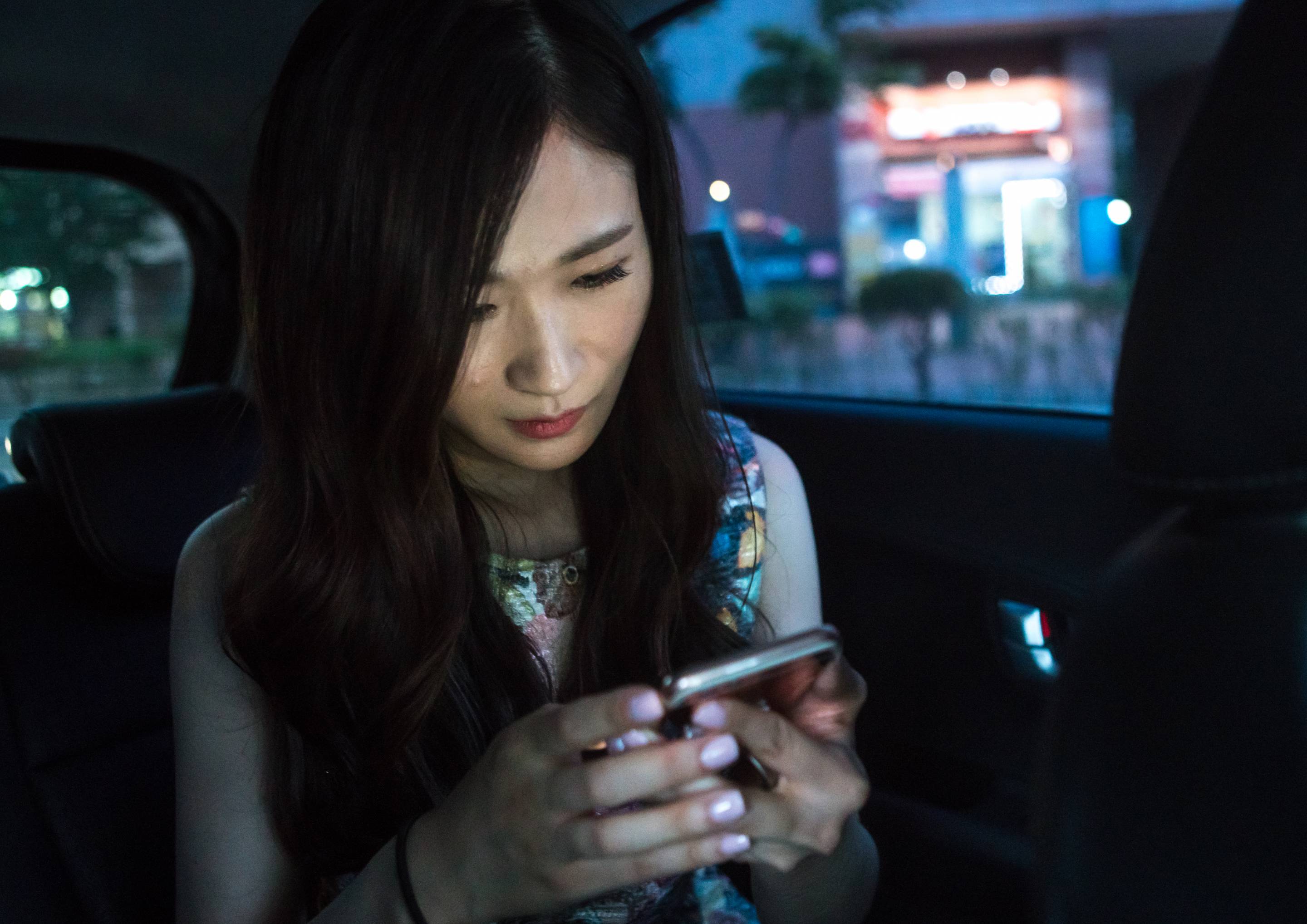 woman texting on phone