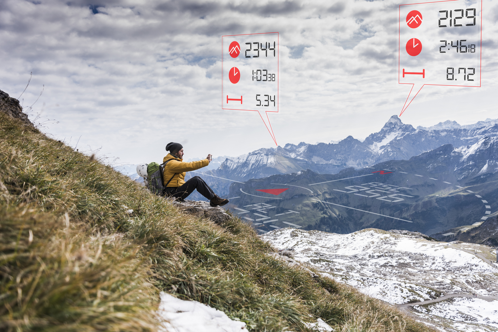 Young man on a hiking trip with data emerging from smartphone