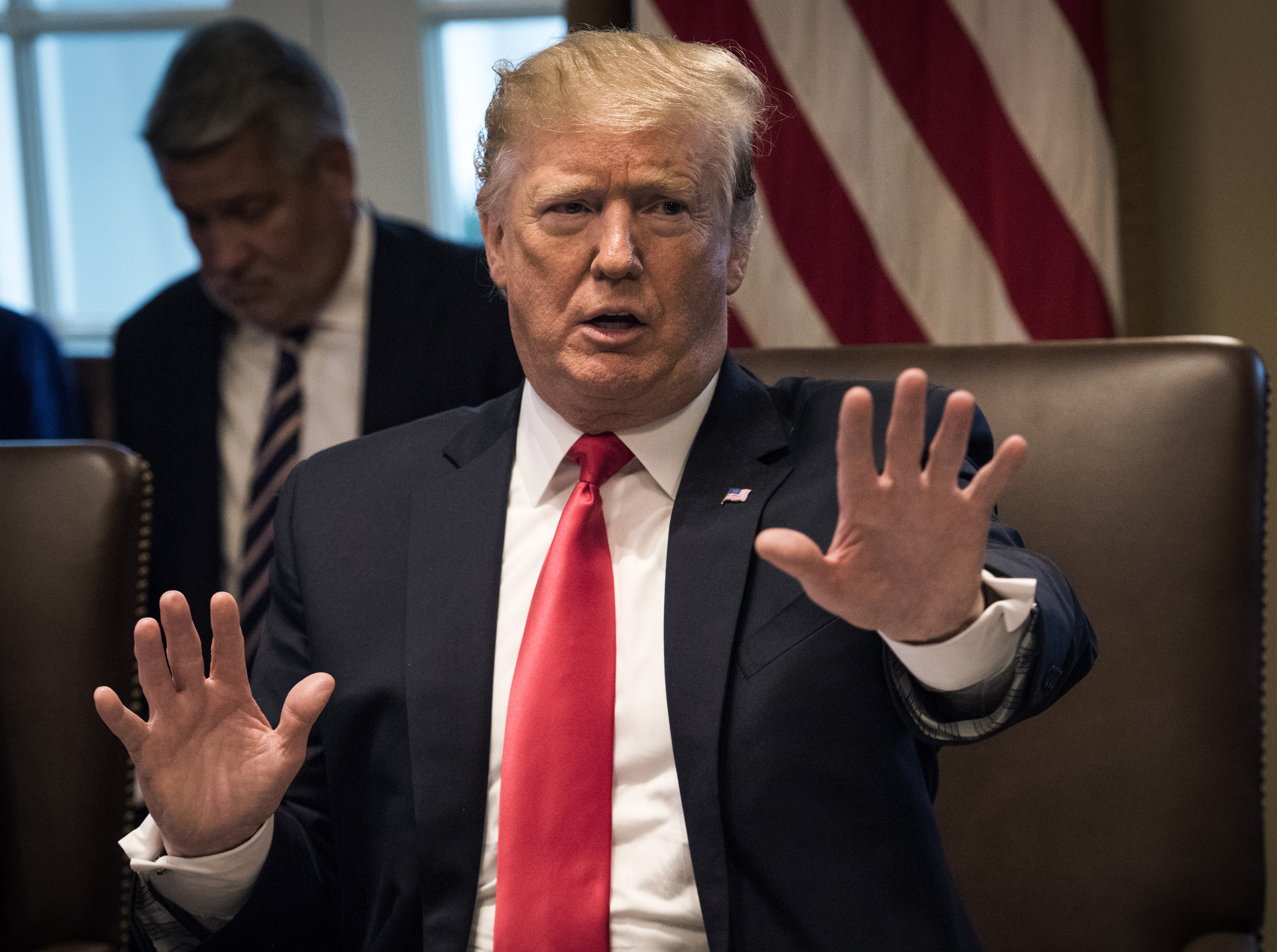 President Donald Trump leads a meeting of his Cabinet, in Washington, DC.