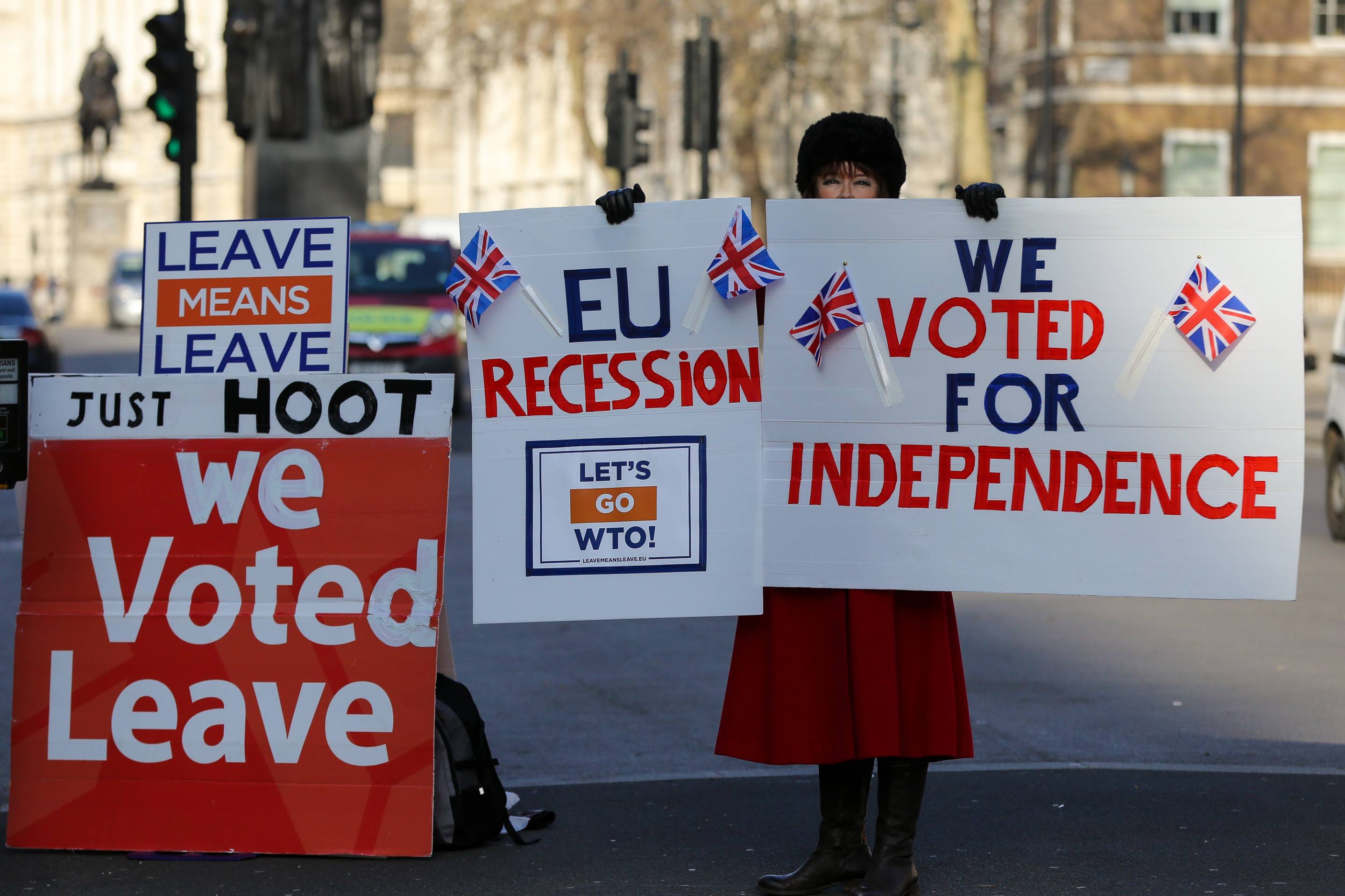 Pro-Brexit demonstrators are seen protesting outside Downing