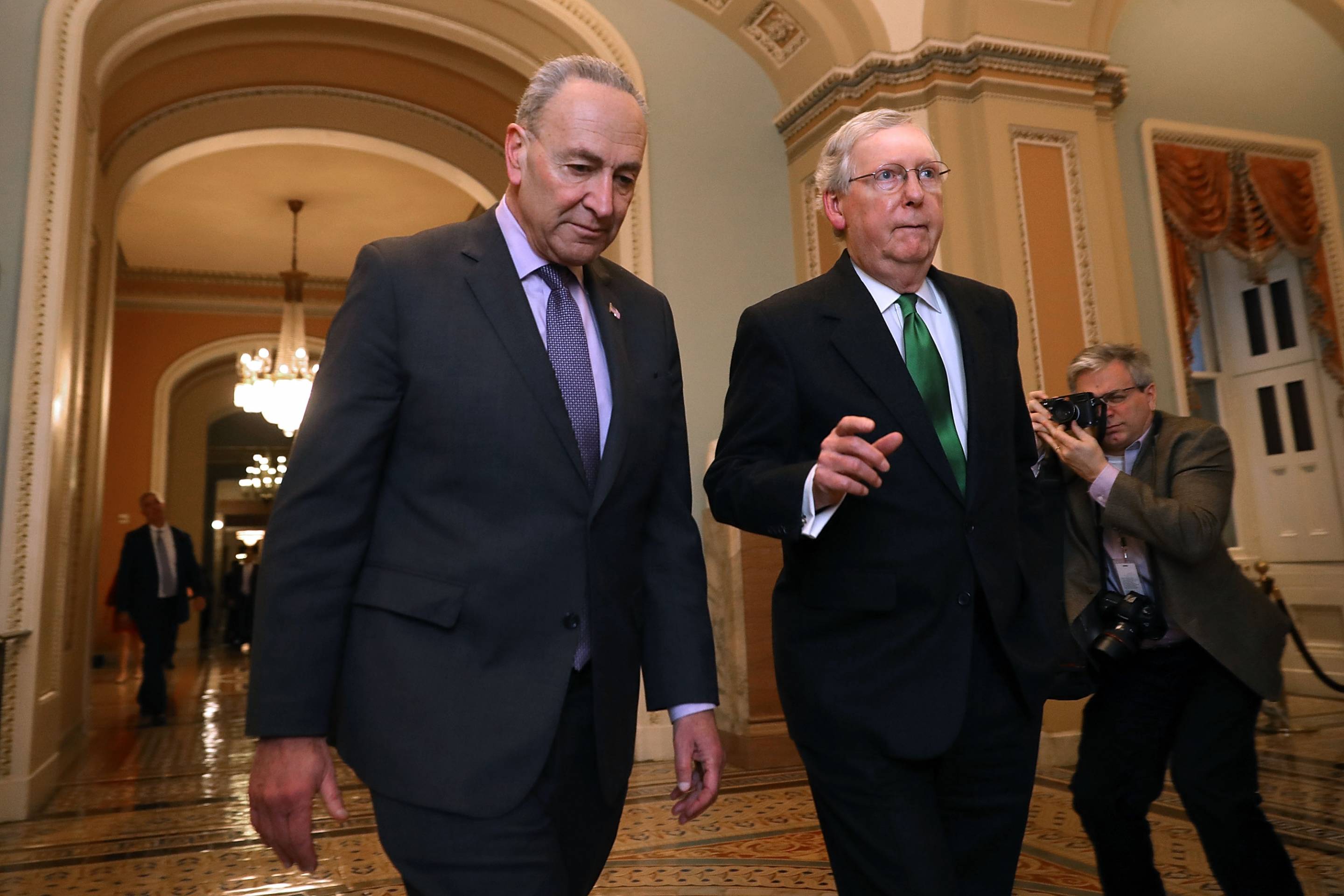 Senate Majority Leader McConnell (R-KY) And Senate Minority Leader Schumer (D-NY) Walk To Senate Chamber Together After Budget Deal Reached