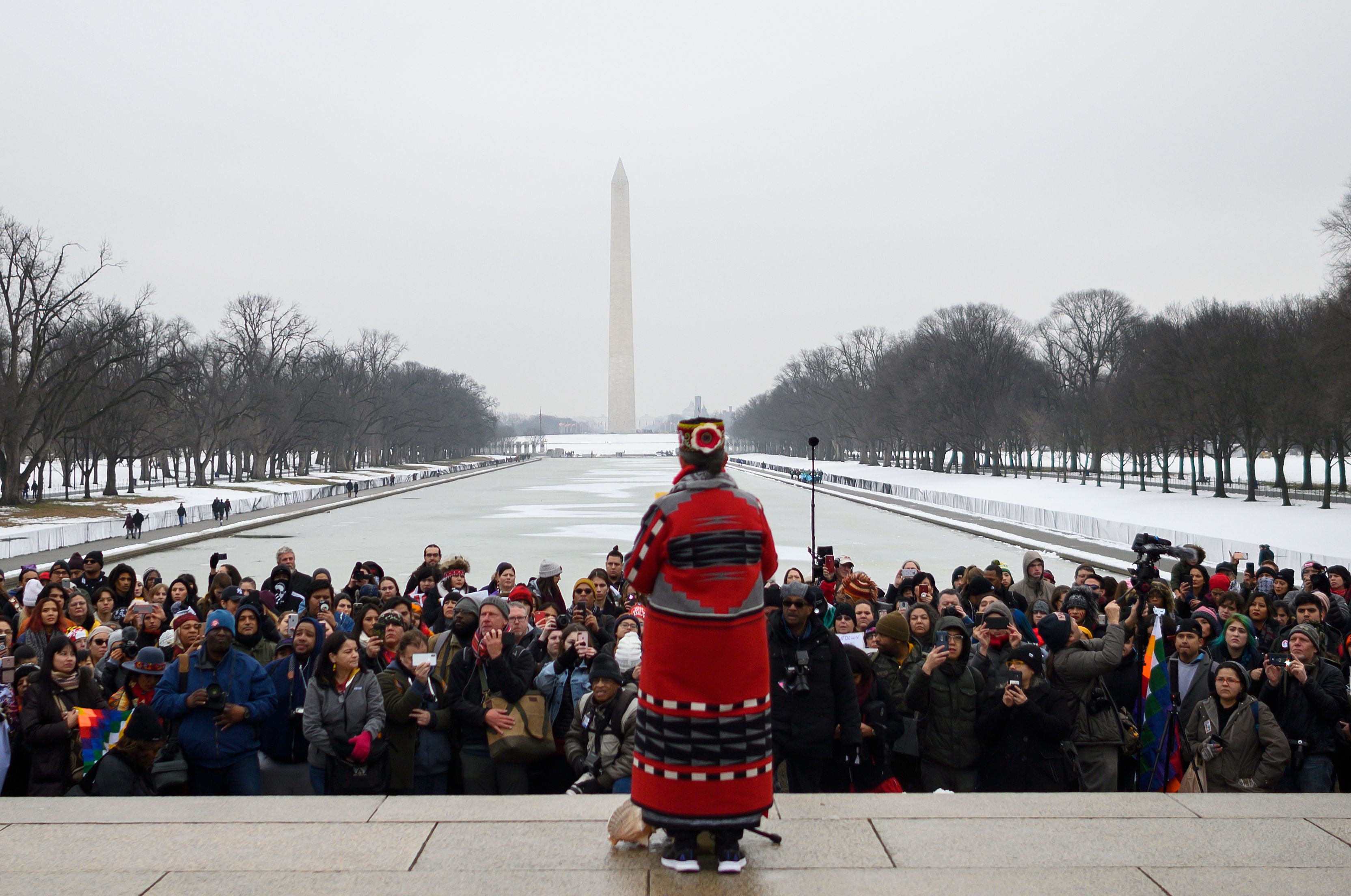 A woman speaks during the Indigenous People's March on the National Mall at the Lincoln Memorial in Washington, DC, on January 18, 2019.