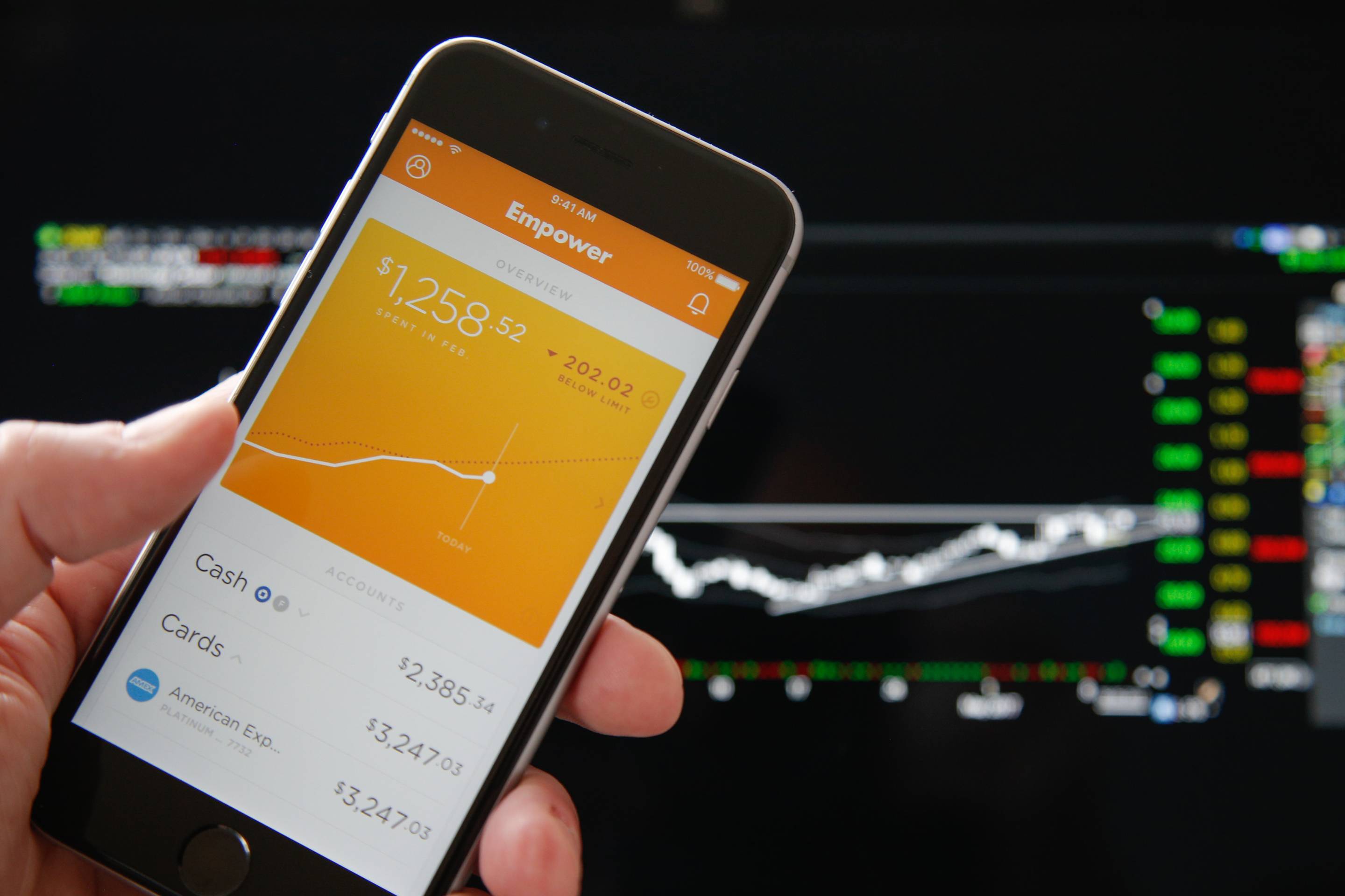 A woman is seen using the Empower app, an app developed to help millenials manage their finances and eventually to replace all banking apps.