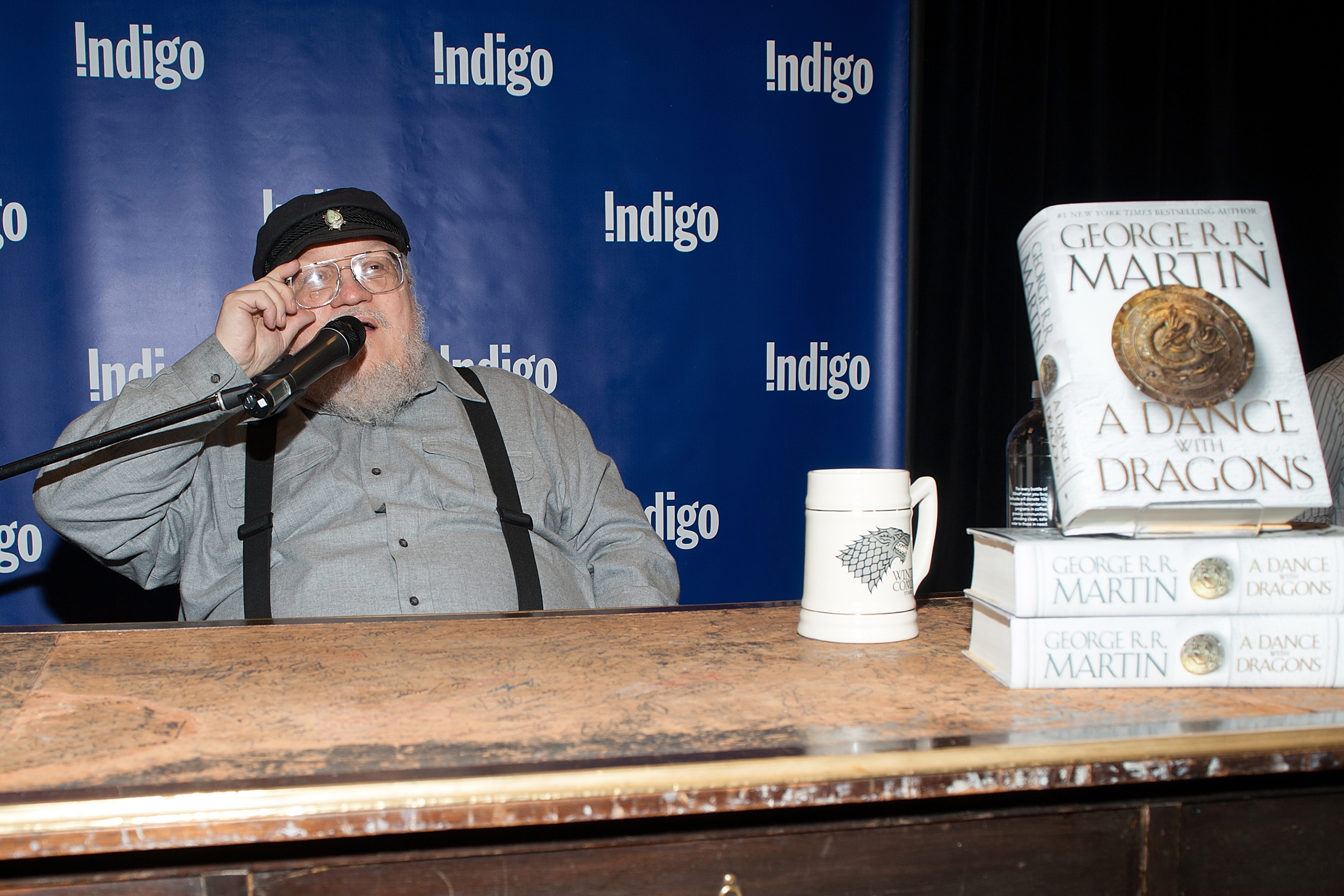 George R.R. Martin Signs Copies Of His New Book "A Dance With Dragons"