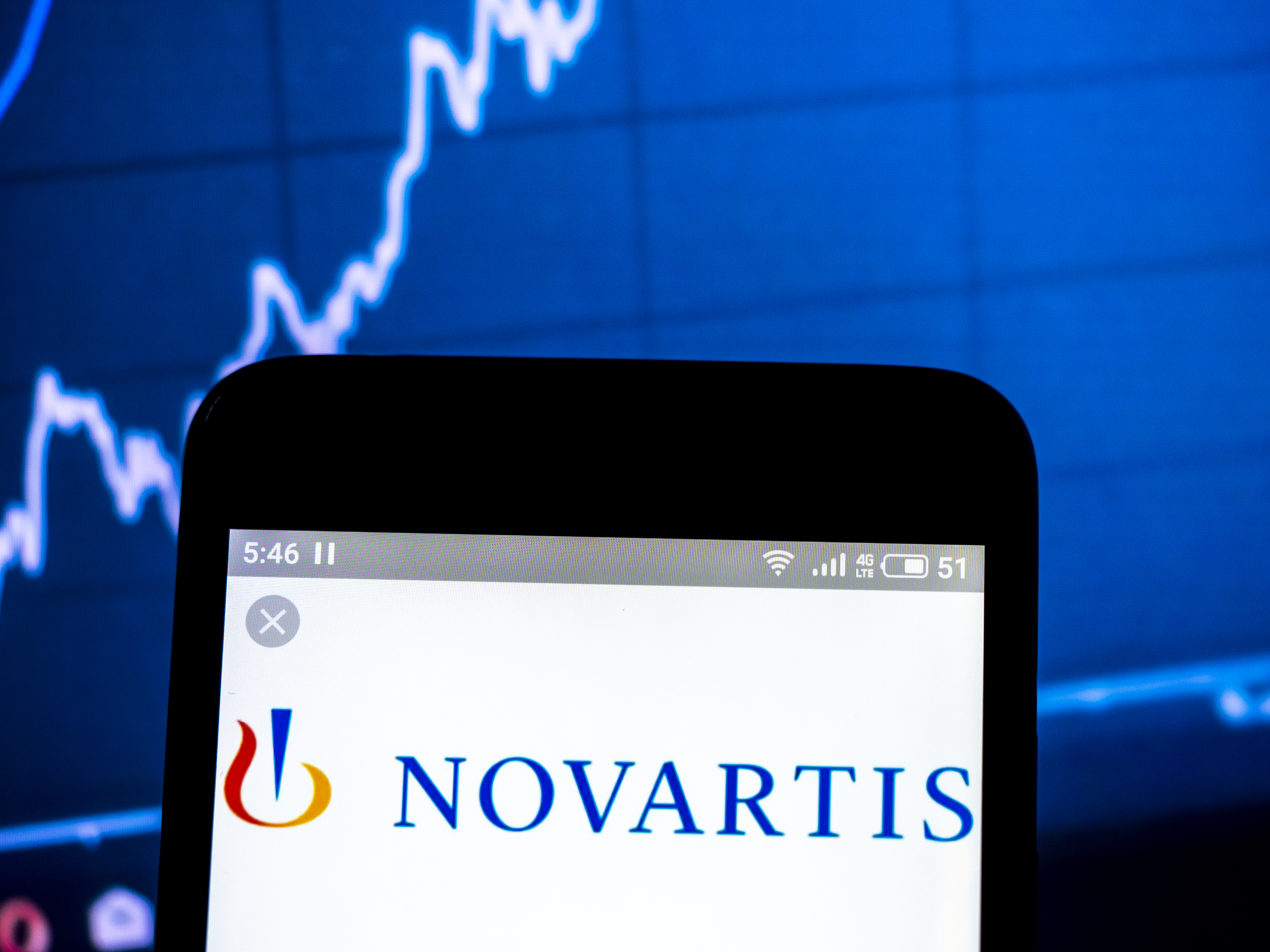 In this photo illustration a Novartis International AG logo