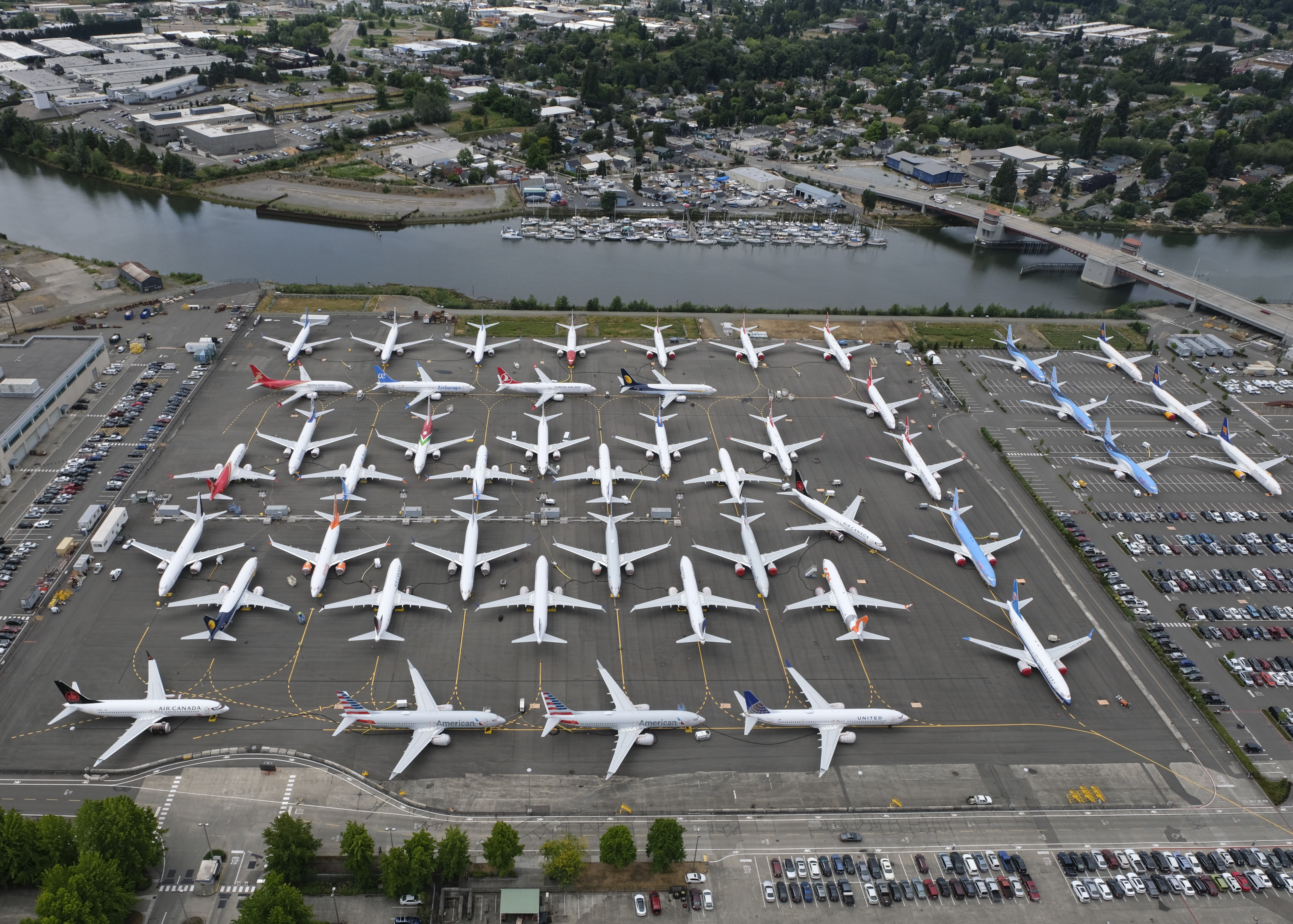 SEATTLE, WA - JUNE 27: Boeing 737 MAX airplanes are stored on employee parking lots near Boeing Field, on June 27, 2019 in Seattle, Washington. After a pair of crashes, the 737 MAX has been grounded by the FAA and other aviation agencies since March, 13, 2019. The FAA has reportedly found a new potential flaw in the Boeing 737 Max software update that was designed to improve safety. (Photo by Stephen Brashear/Getty Images)