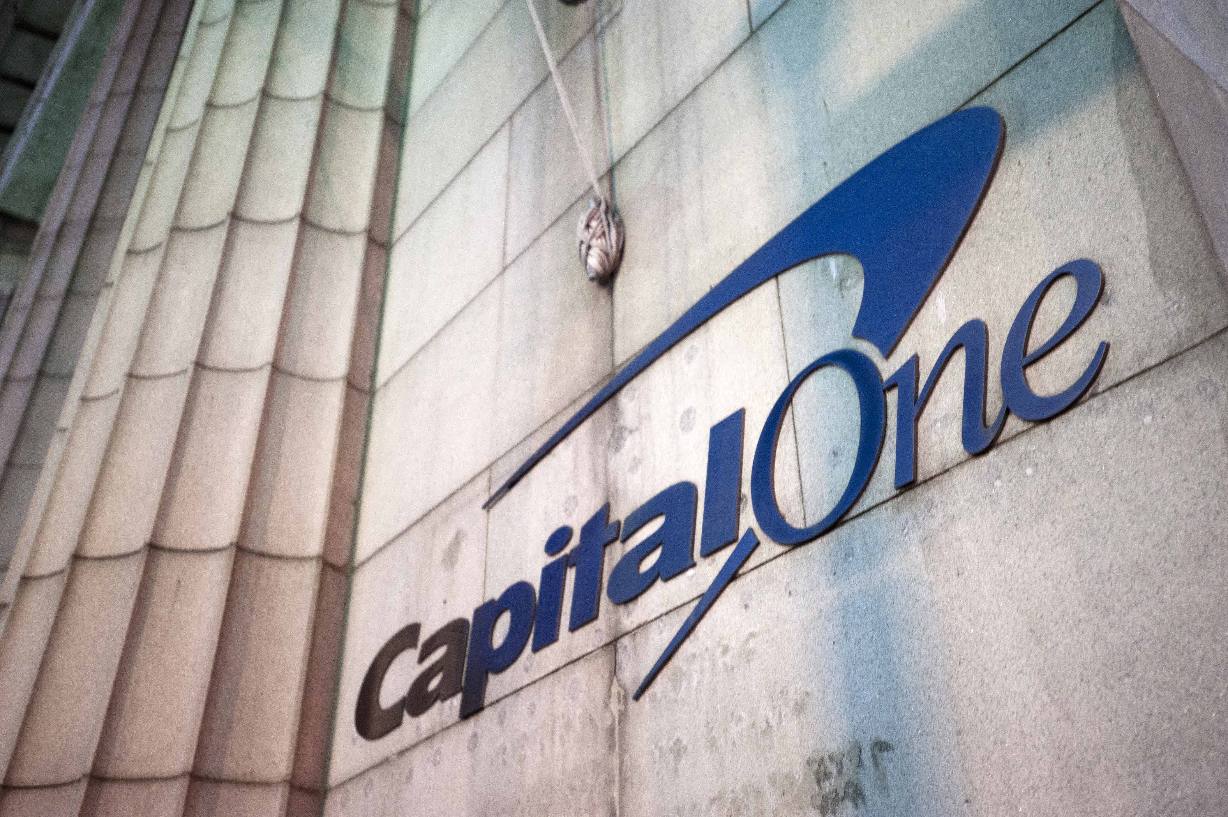 Capital One signage is displayed outside of a bank branch in the Brooklyn