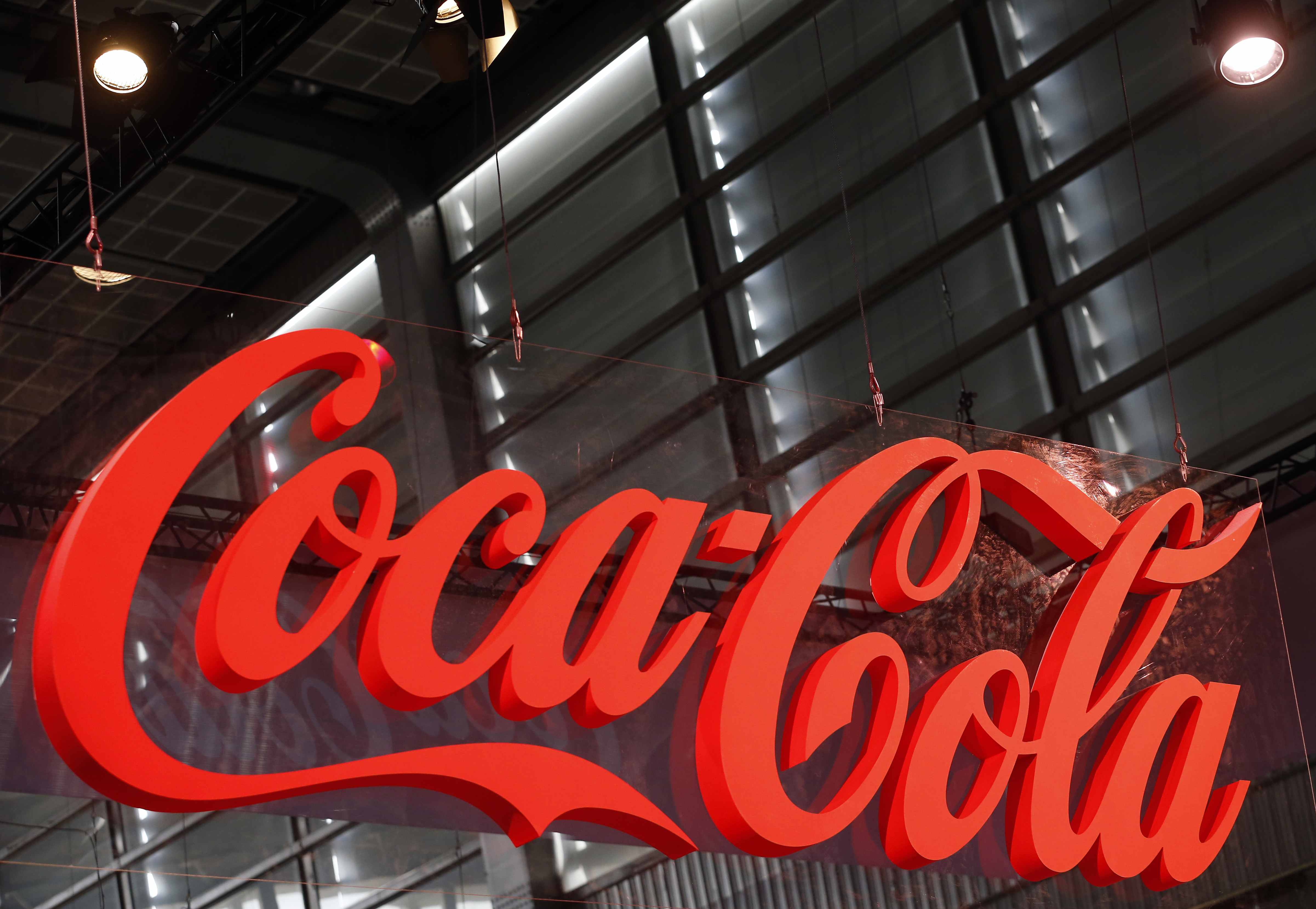 PARIS, FRANCE - OCTOBER 27: The logo of the US soda brand Coca-Cola is displayed during the 'Paris Games Week' on October 27, 2018 in Paris, France. 'Paris Games Week' is an international trade fair for video games and runs from October 26 to 31, 2018. (Photo by Chesnot/Getty Images)