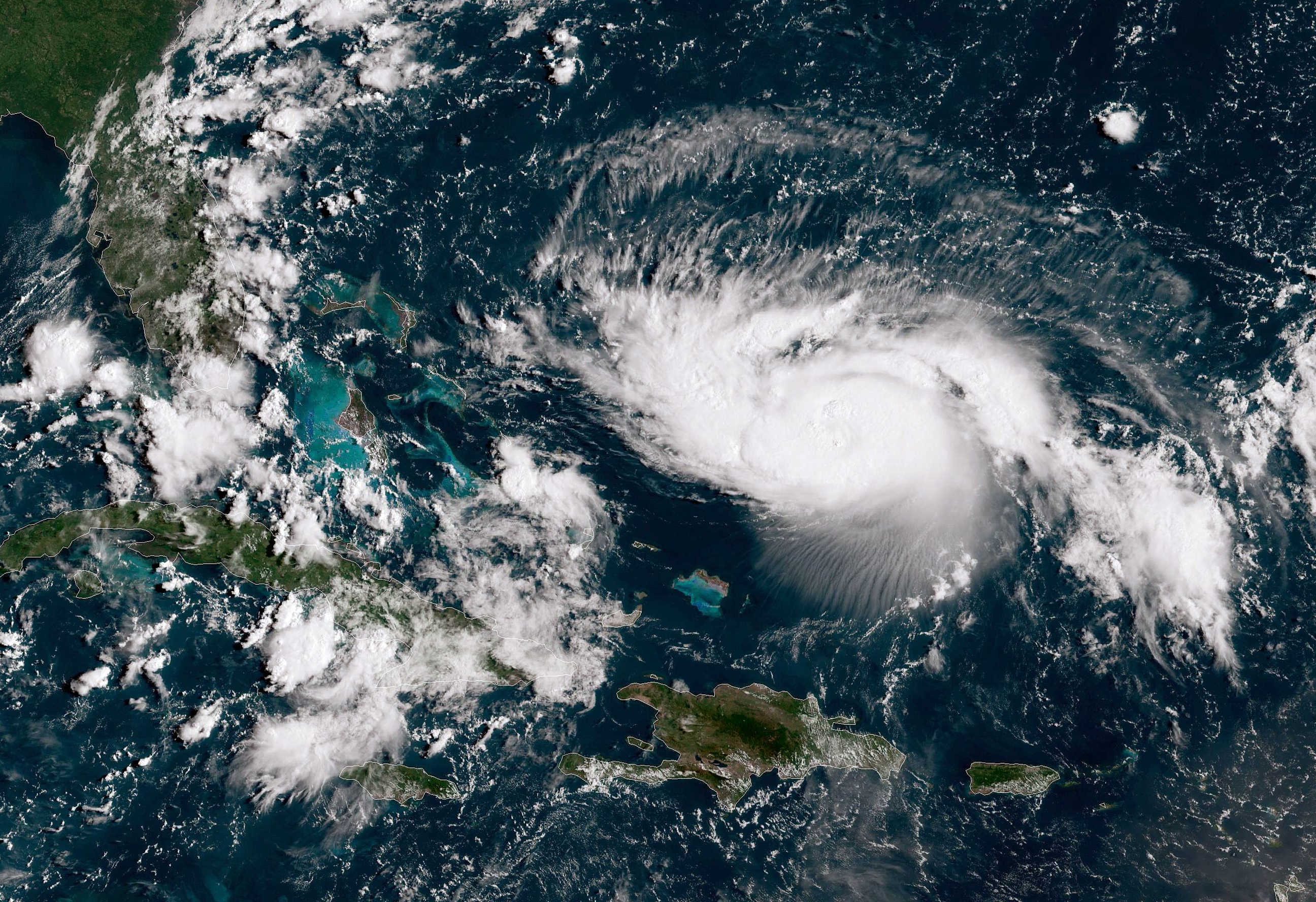 ATLANTIC OCEAN - AUGUST 30:  In this NOAA GOES-East satellite image, Hurricane Dorian, now a Cat. 2 storm with maximum sustained winds of 110 mph, gains strength as it tracks towards the Florida coast taken at 13:40Z August 30, 2019 in the Atlantic Ocean. According to the National Hurricane Center Dorian is predicted to hit Florida as a Category 4 storm over the Labor Day weekend. (Photo by NOAA via Getty Images)