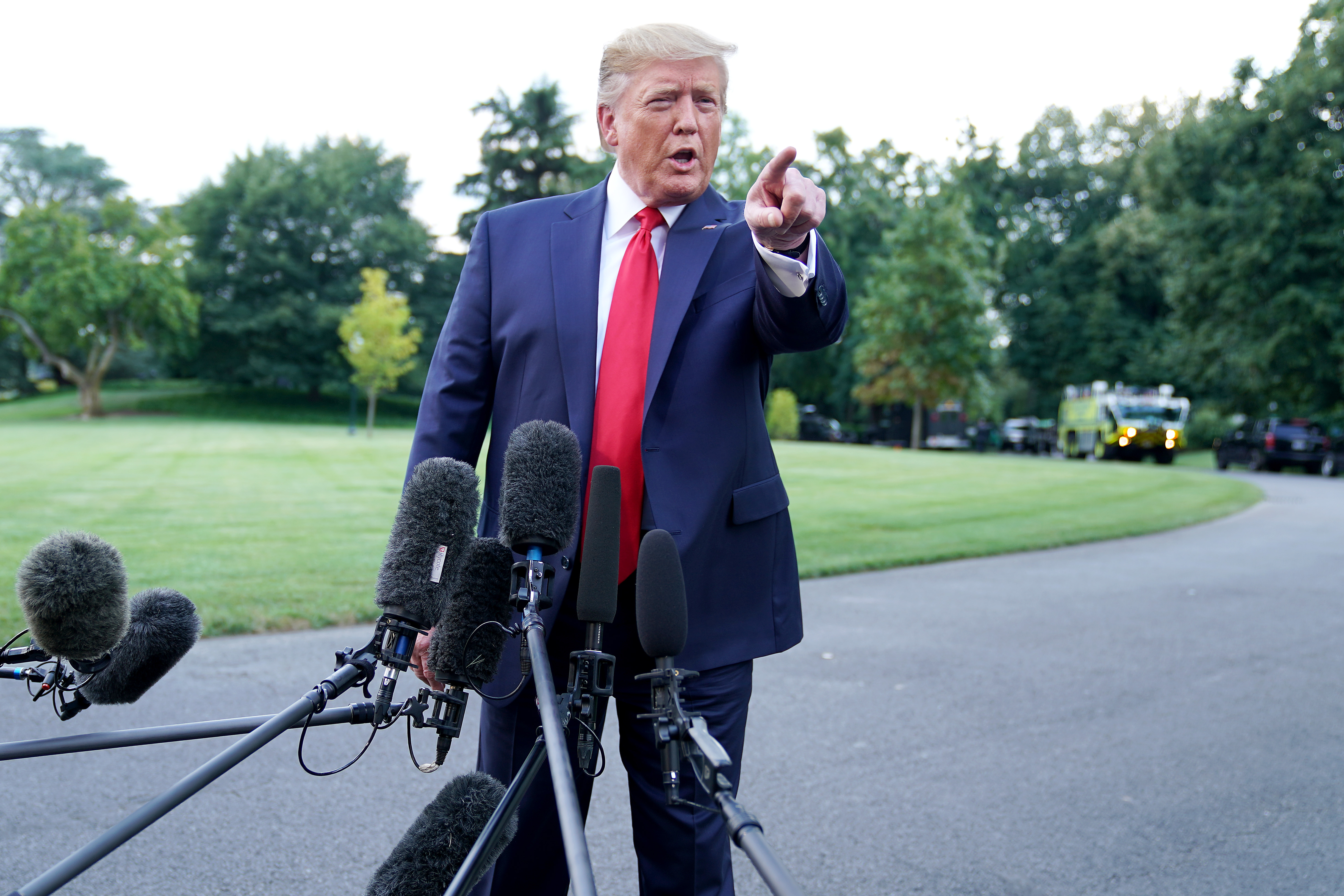 WASHINGTON, DC - AUGUST 01: U.S. President Donald Trump talks to journalists while departing the White House August 01, 2019 in Washington, DC. Trump is traveling to Cincinnati, Ohio, for a campaign rally. (Photo by Chip Somodevilla/Getty Images)