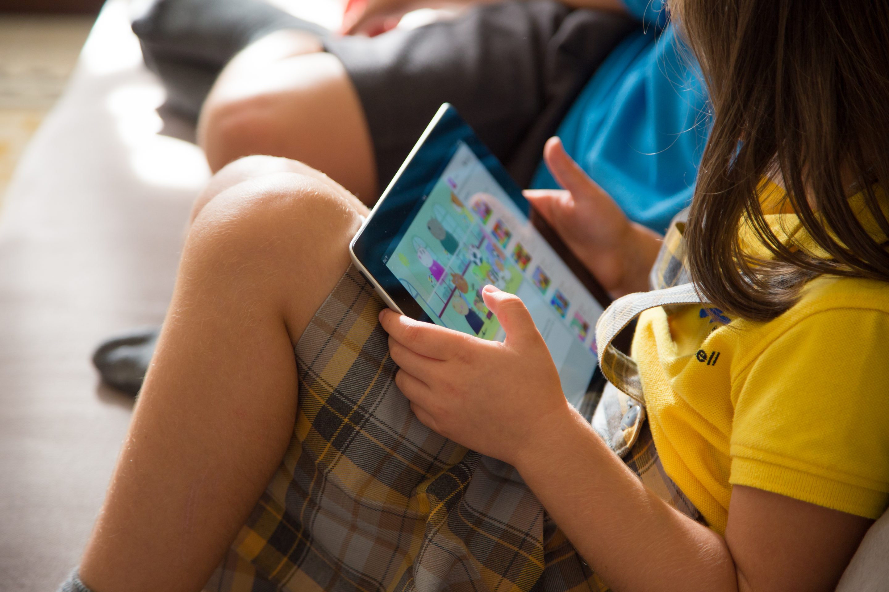Child watching videos on a tablet
