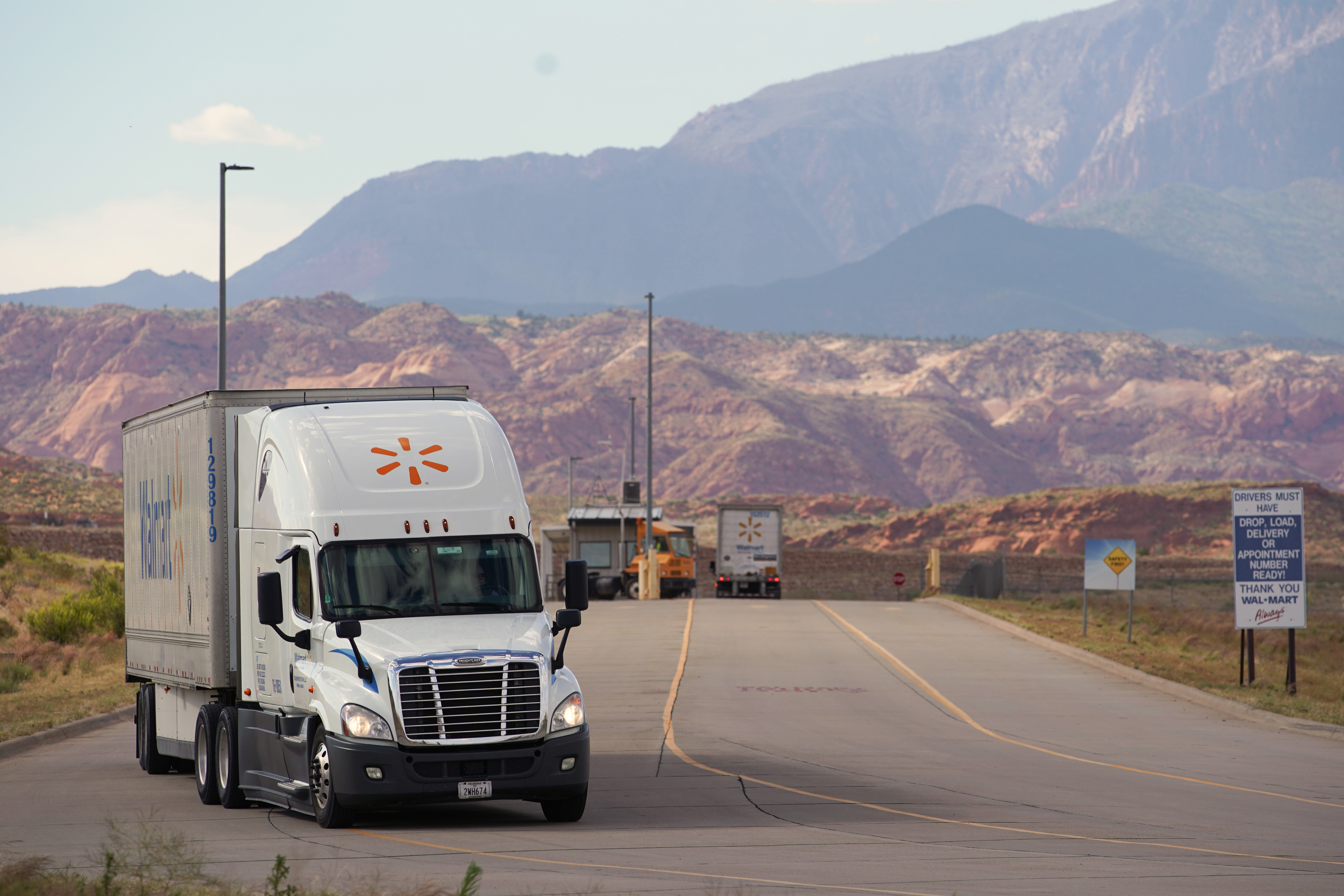 WASHINGTON, UT - JUNE 06: Trucks enter and leave through a security check point at a large Walmart regional distribution center on June 6, 2019 in Washington, Utah. Walmart has announced one day delivery and other services to challenge Amazon. (Photo by George Frey/Getty Images)