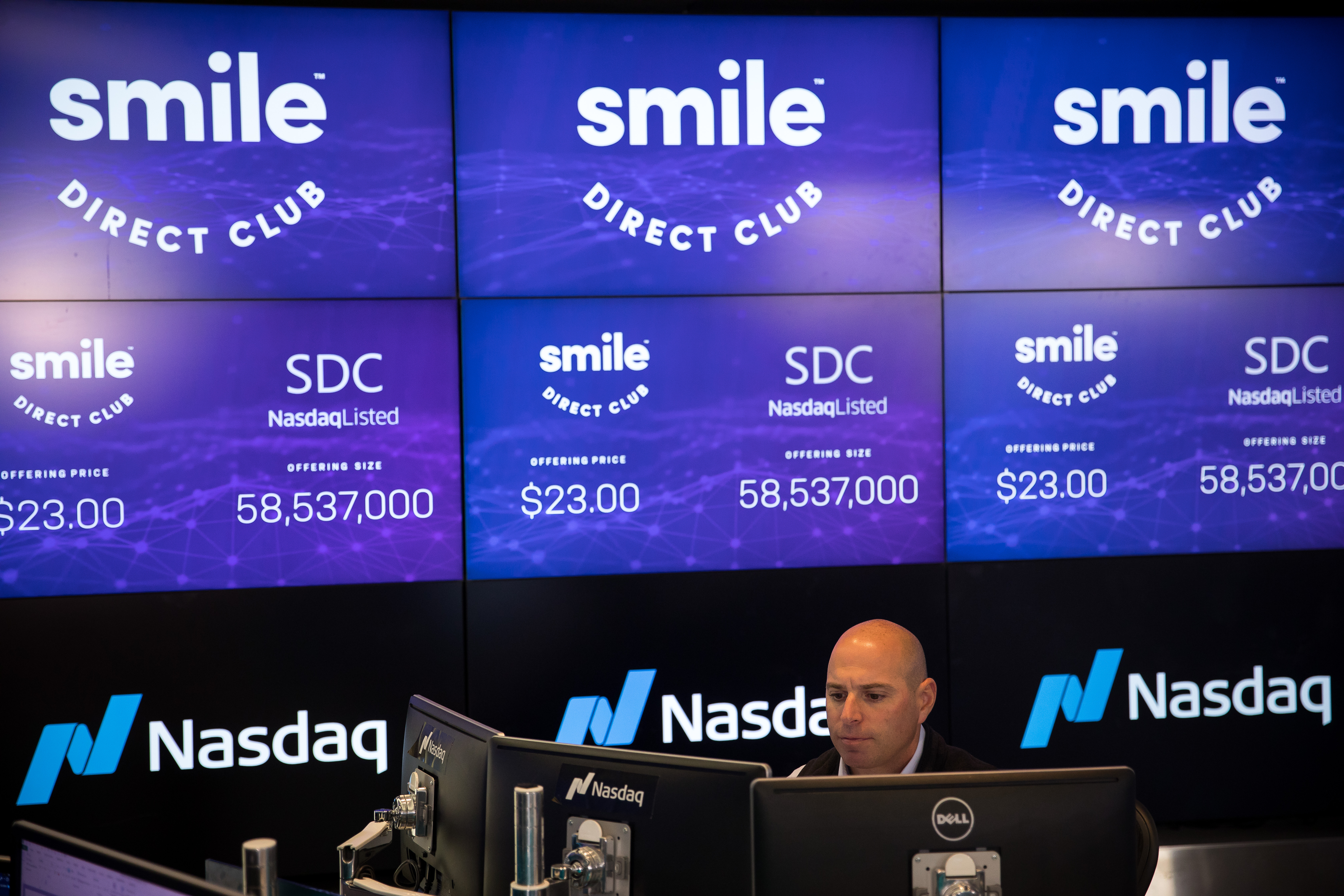Jay Heller, initial public offering (IPO) execution officer at Nasdaq Inc., works during during the SmileDirectClub Inc. IPO at the Nasdaq MarketSite in New York, U.S., on Thursday, Sept. 12, 2019. SmileDirectClub Inc. shares declined 12% from their initial public offering price in Thursday's debut. Photographer:
