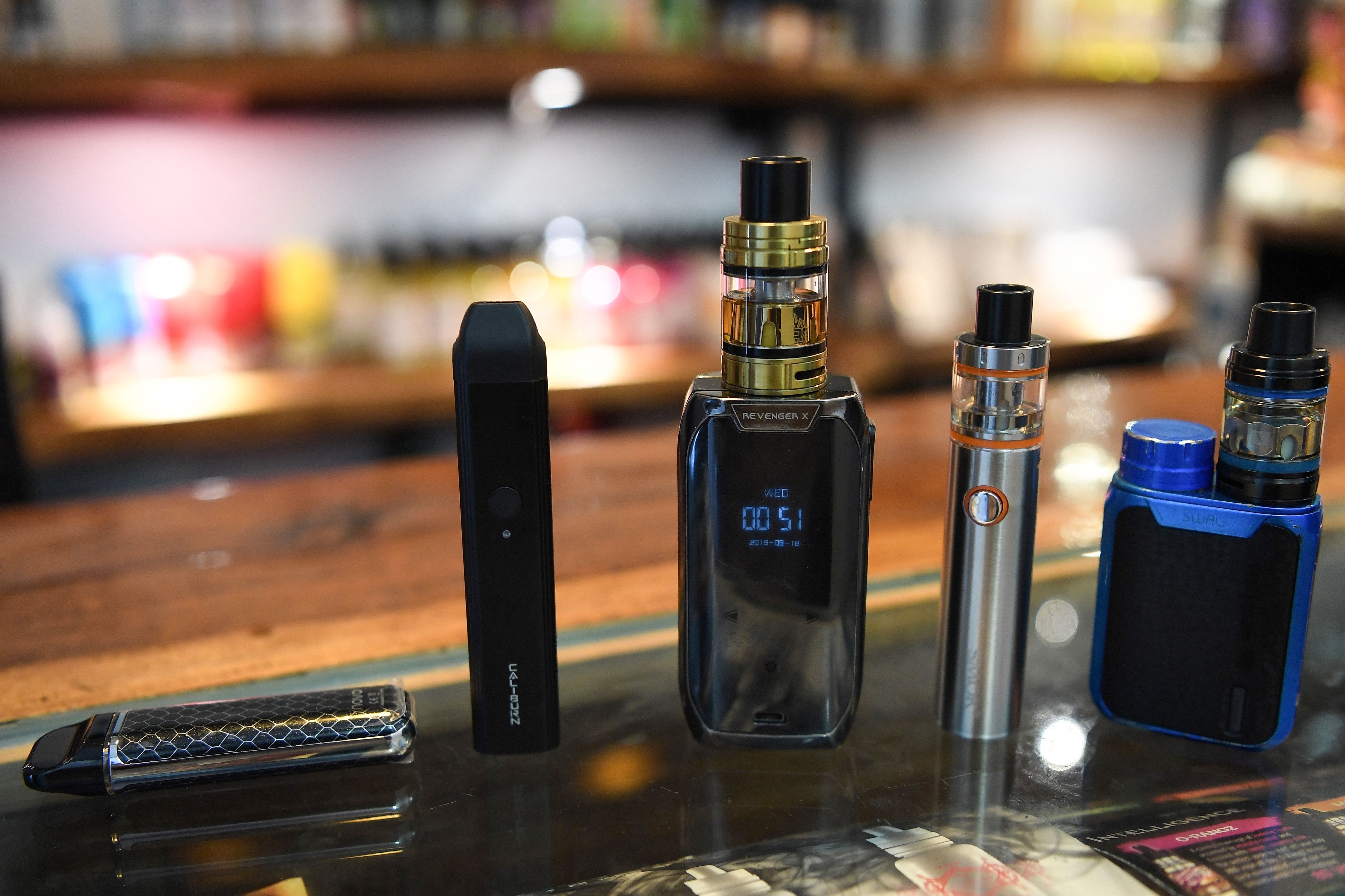 Electronic cigarette devices are pictured on display at a vaping shop in New Delhi on September 18, 2019. - India banned on September 18 the sale of electronic cigarettes, as a backlash gathers pace worldwide due to health concerns about a product promoted as less harmful than smoking tobacco. (Photo by Prakash SINGH / AFP) (Photo credit should read PRAKASH SINGH/AFP/Getty Images)