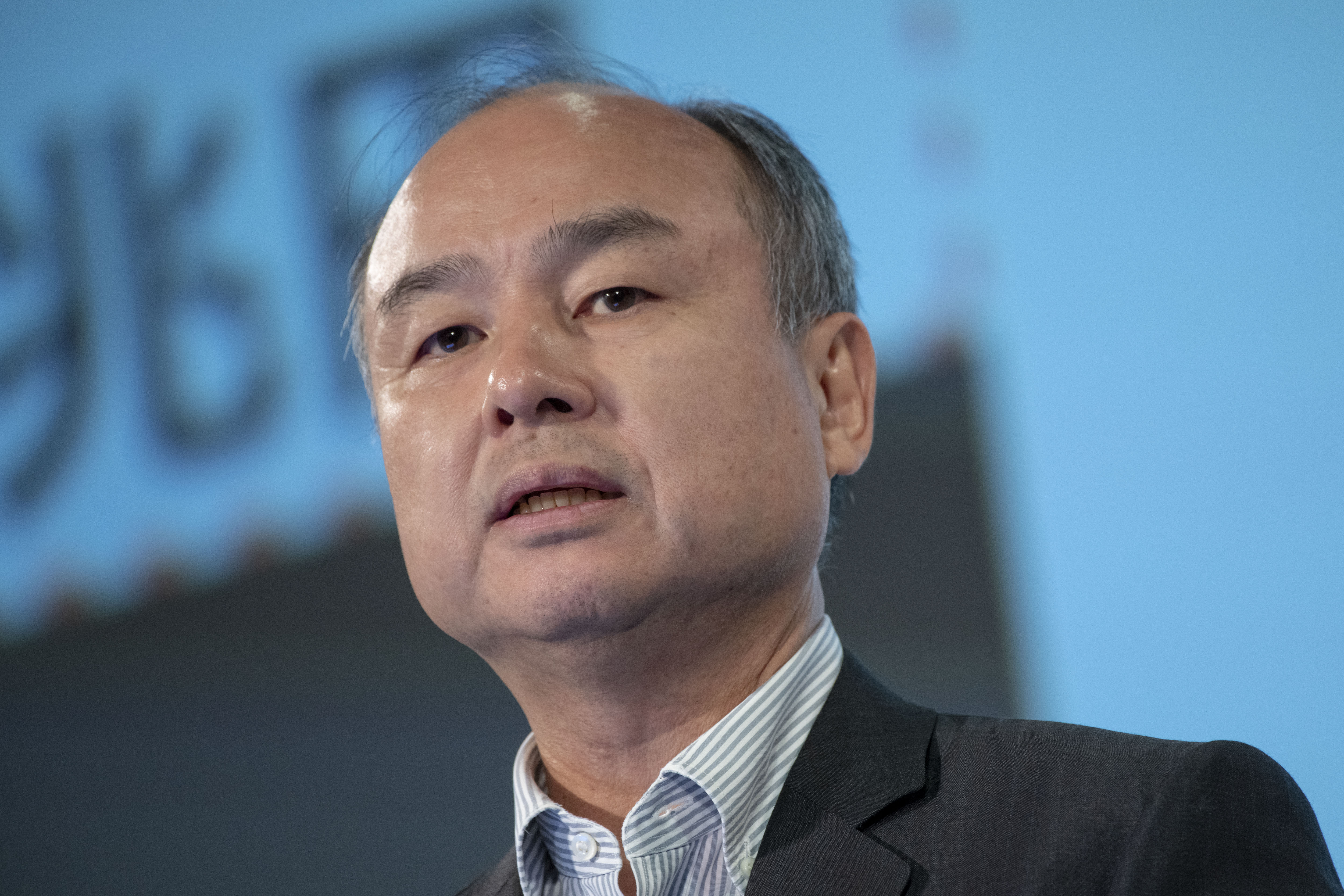Masayoshi Son, chairman and chief executive officer of SoftBank Group Corp., speaks during a news conference in Tokyo, Japan, on Wednesday, Aug. 7, 2019. SoftBank reported first-quarter profit that beat the highest analyst estimate thanks to valuation gains from Vision Fund investments such as Slack Technologies Inc. (Photo by Alessandro Di Ciommo/NurPhoto via Getty Images)