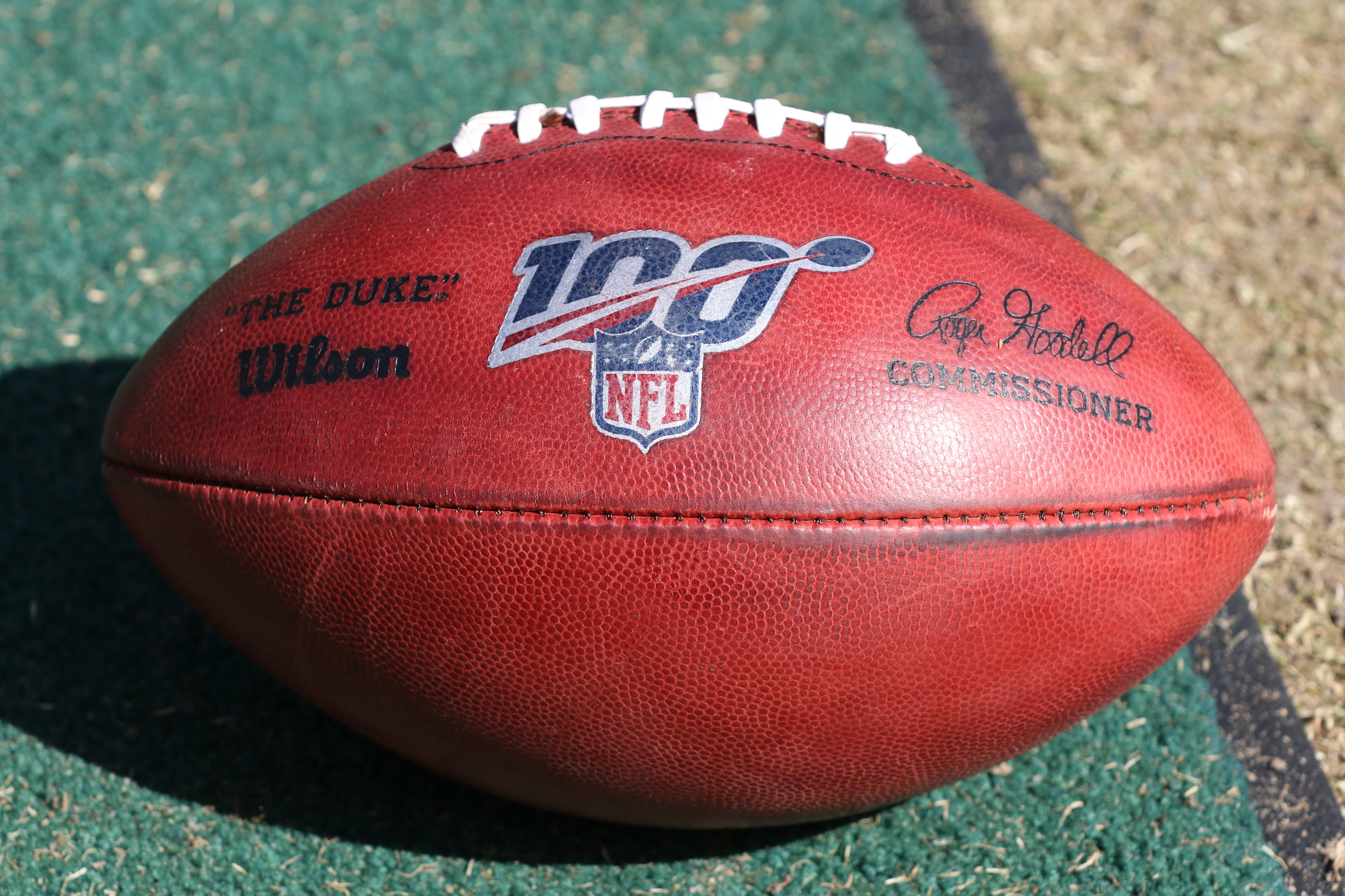 KANSAS CITY, MO - OCTOBER 13: A view of a football with the 100th NFL season logo during an NFL matchup between the Houston Texans and Kansas City Chiefs on October 13, 2019 at Arrowhead Stadium in Kansas City, MO. (Photo by Scott Winters/Icon Sportswire via Getty Images)