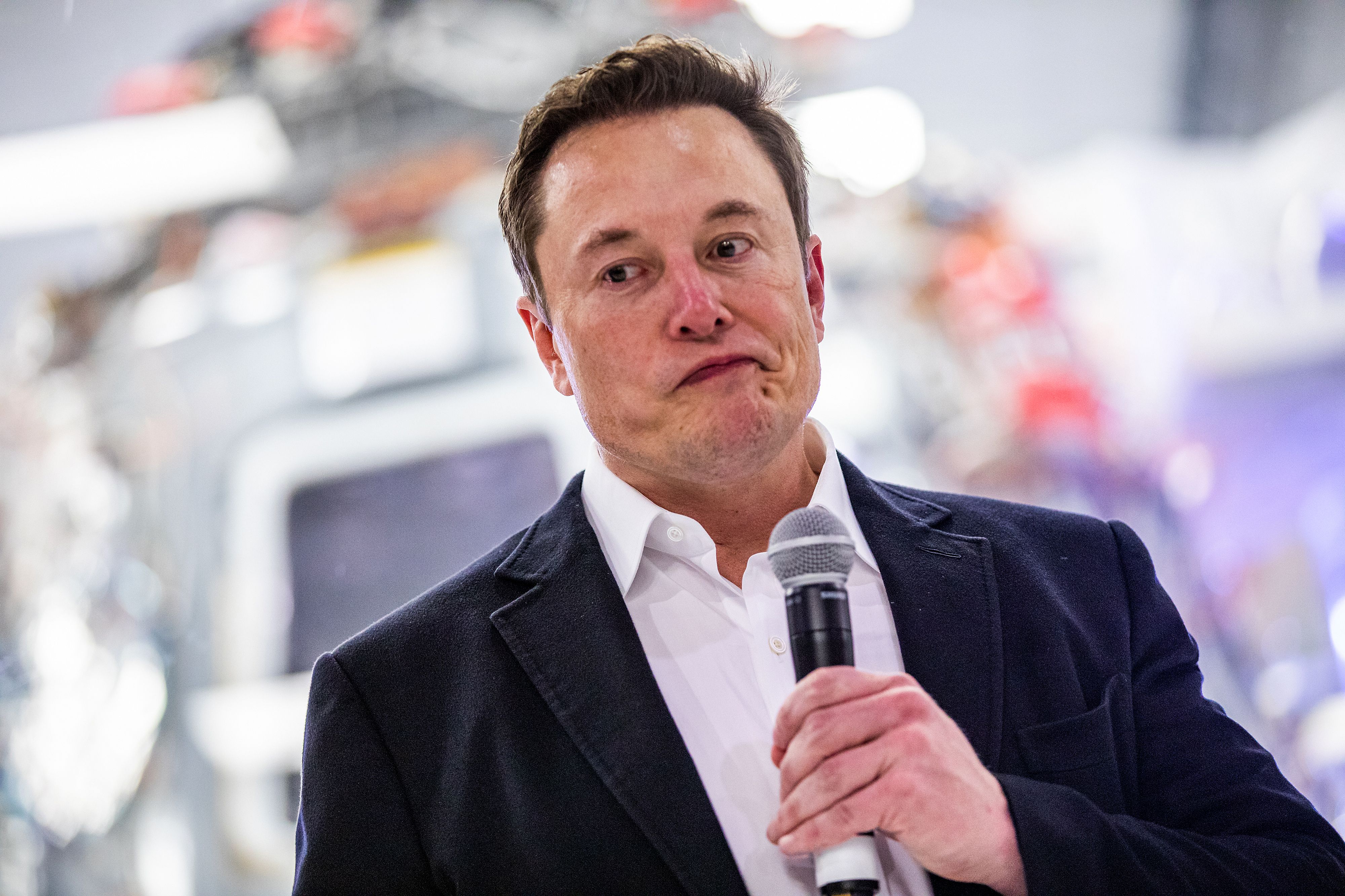 SpaceX founder Elon Musk addresses the media during a press conference announcing new developments of the Crew Dragon reusable spacecraft, at SpaceX headquarters in Hawthorne, California on October 10, 2019. (Photo by Philip Pacheco / AFP) (Photo by PHILIP PACHECO/AFP via Getty Images)