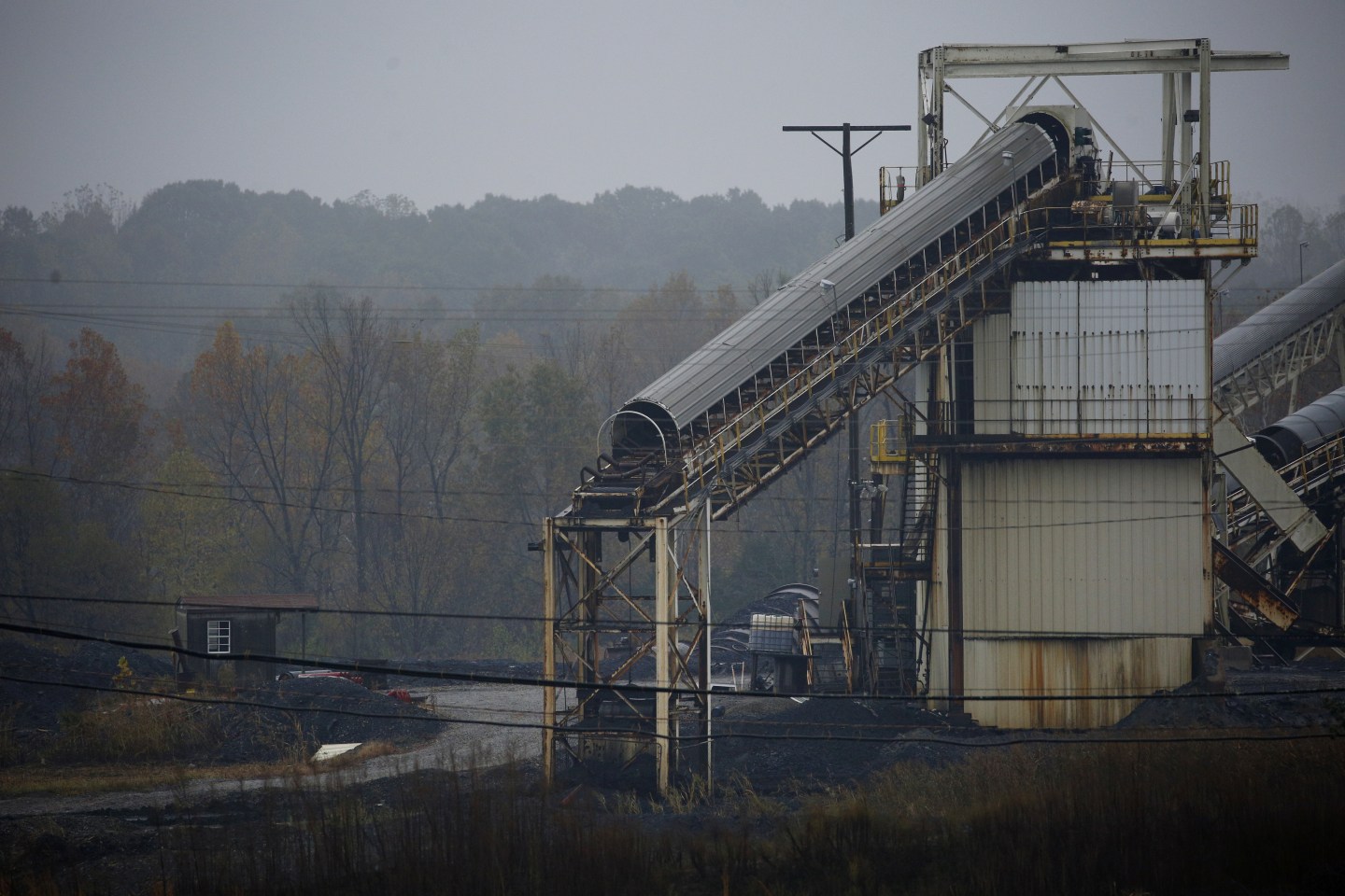 A coal conveyor is seen on the grounds of the recently idled Muhlenberg County Coal Co. Paradise Mine, a subsidiary of Murray Energy Holdings Co., in Central City, Kentucky, U.S., on Wednesday, Oct. 30, 2019. Murray Energy, the largest privately owned U.S. coal company, filed for Chapter 11 protection in the U.S. Bankruptcy Court in Columbus, Ohio, to restructure more than $2.7 billion of debt. Photographer: Luke Sharrett/Bloomberg via Getty Images