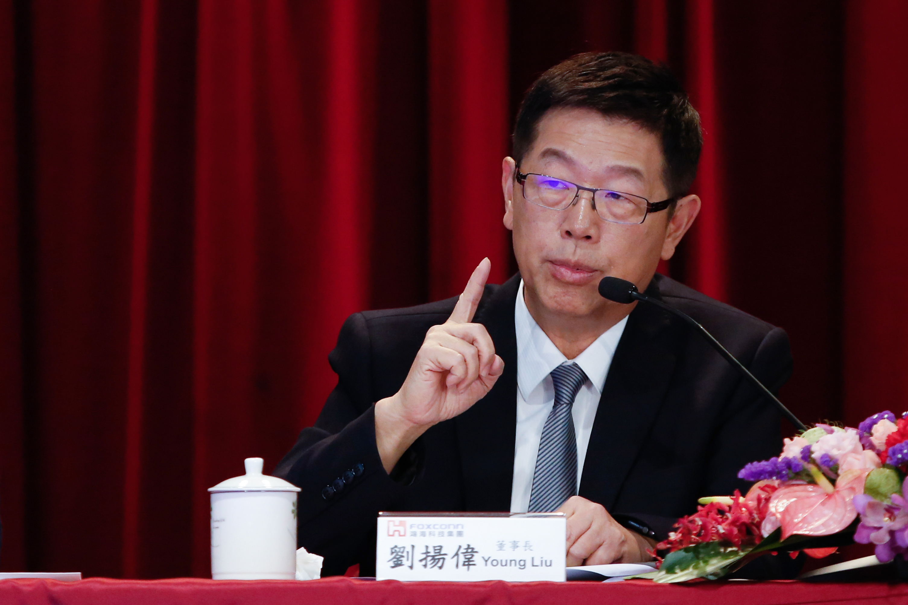 Young Liu, chairman of Hon Hai Precision Industry Co., speaks during a news conference at the company's headquarters in New Taipei City, Taiwan, on Wednesday, Nov. 13, 2019. Hon Hai, the largest listed arm of Foxconn Technology Group, reported quarterly profit above analysts estimates, indicating solid demand for Apple Inc.s iPhone 11 range. Photographer: Ashley Pon/Bloomberg via Getty Images