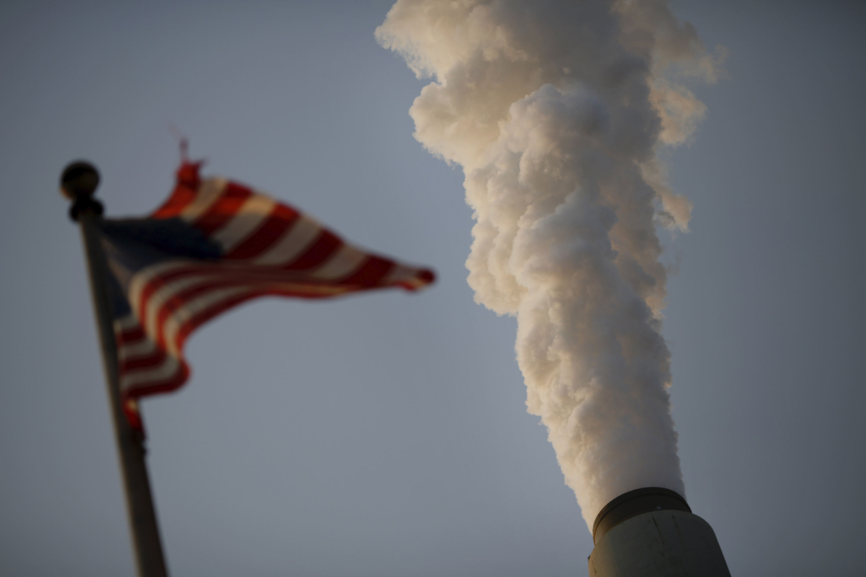 Emissions rise from the American Electric Power Company's coal-fired John E. Amos Power Plant in Winfield, West Virginia, U.S. on Thursday, July 31, 2014. Luke Sharrett for Bloomberg