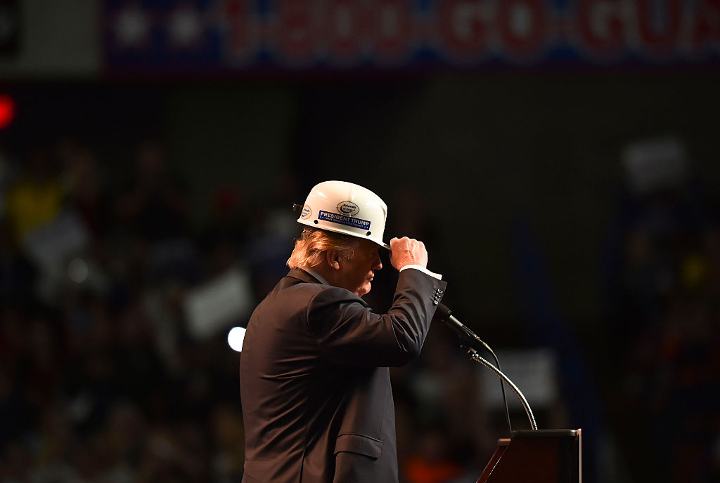 Trump wears a coal miner's hat while addressing his supporters during a rally at the Charleston Civic Center on May 5, 2016 in Charleston, WV. (Photo by Ricky Carioti/The Washington Post via Getty Images)